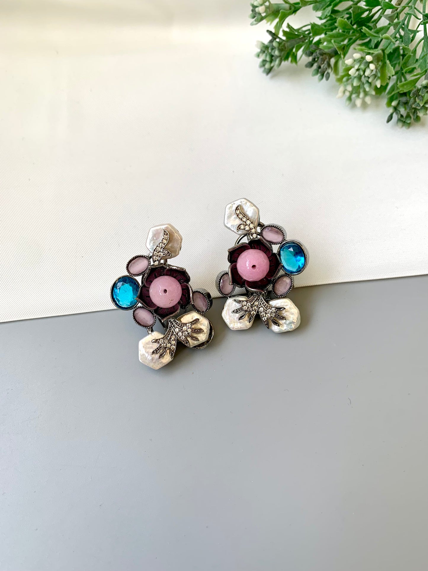 Mirana baroque pearl earrings in rhodium oxidized finish with onyx and american diamonds