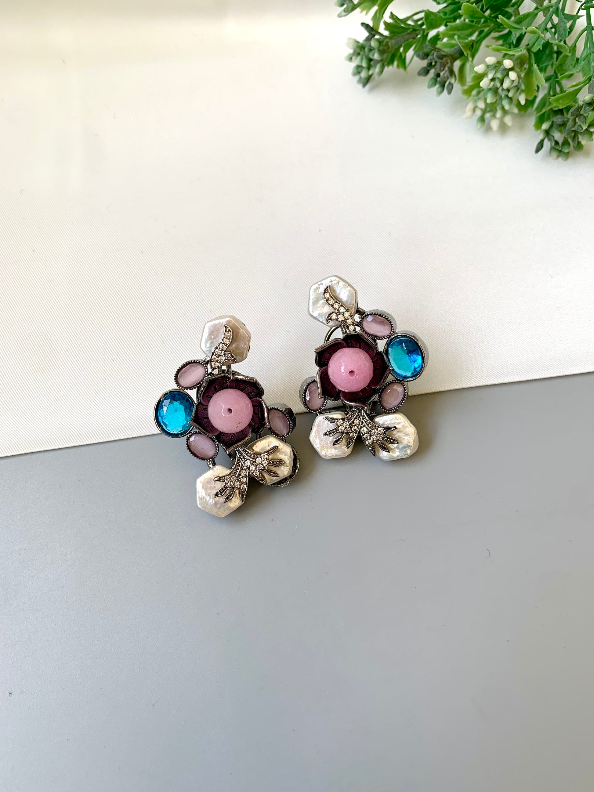 Mirana baroque pearl earrings in rhodium oxidized finish with onyx and american diamonds