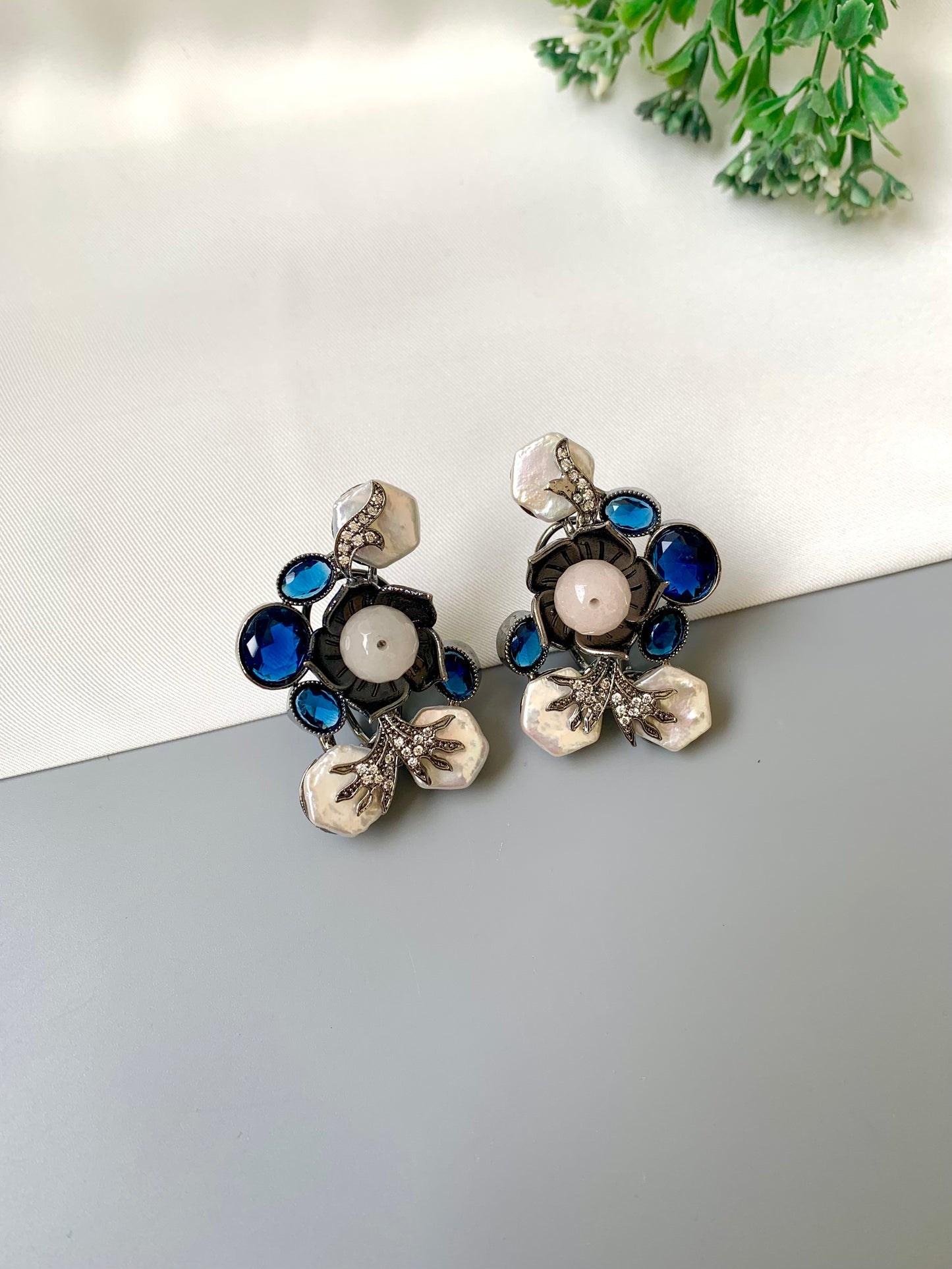 Mirana baroque pearl earrings in rhodium oxidized finish with sapphire and american diamonds