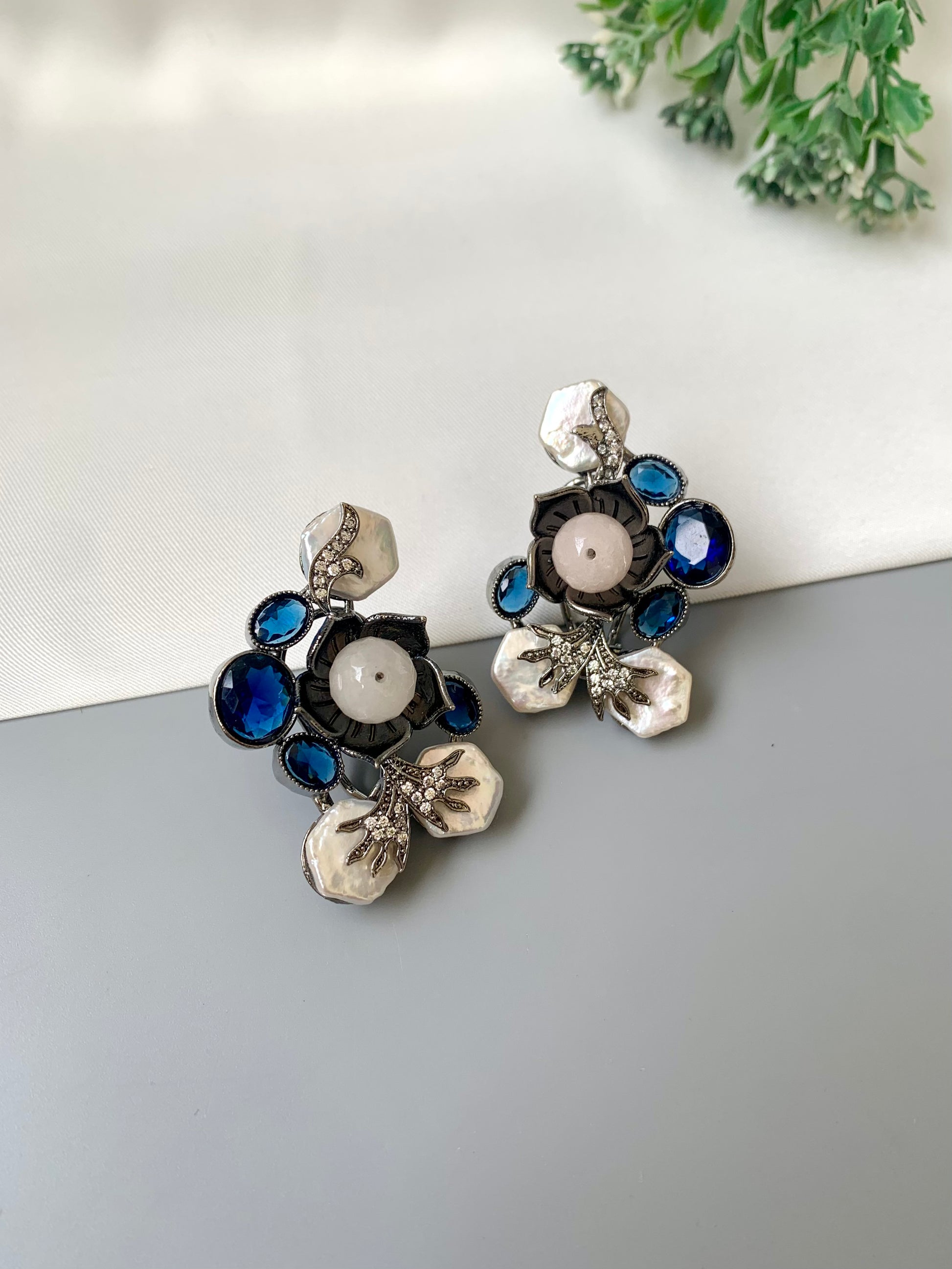 Mirana baroque pearl earrings in rhodium oxidized finish with sapphire and american diamonds