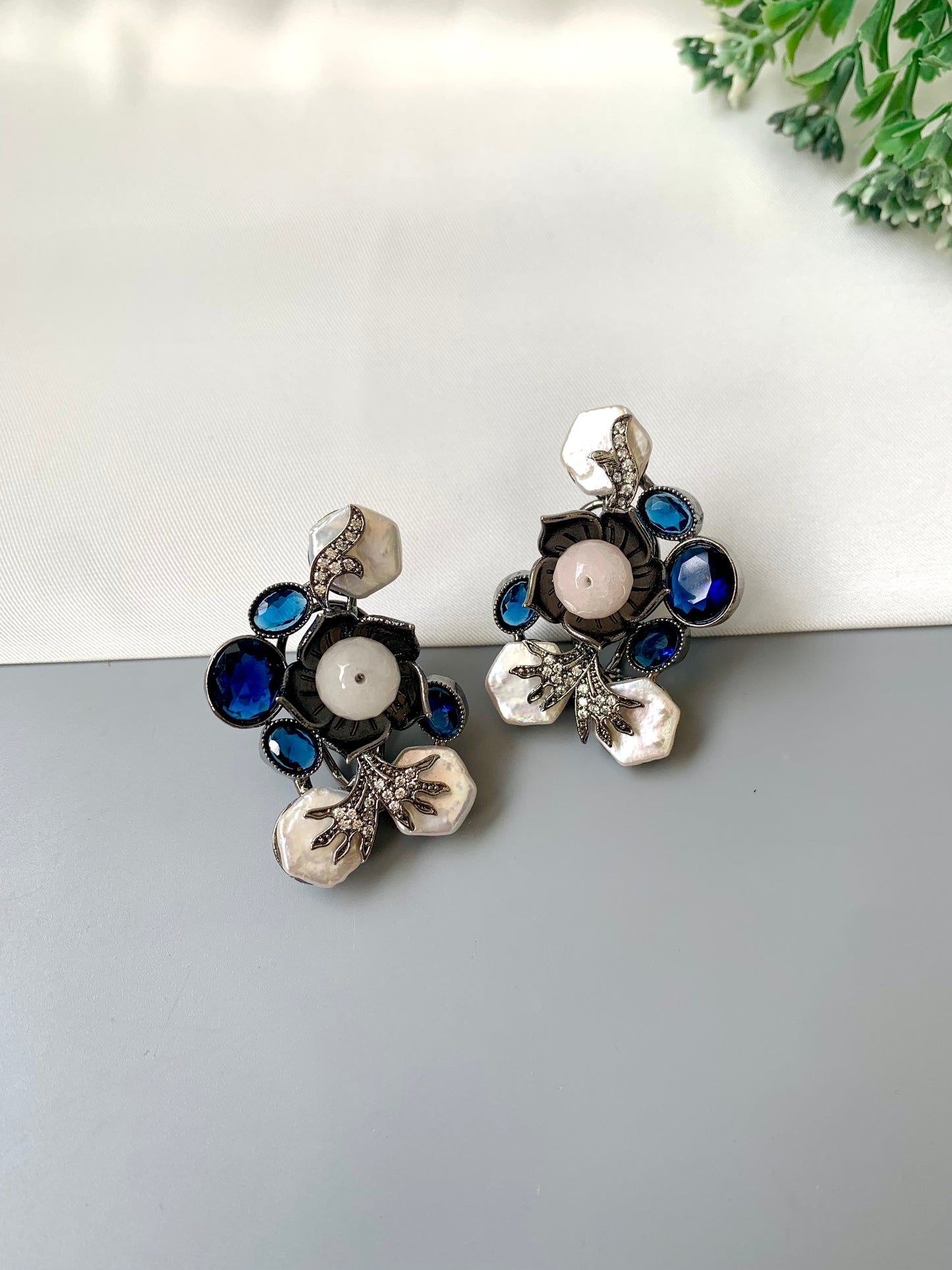Mirana baroque pearl earrings in rhodium oxidized finish with sapphire and american diamonds