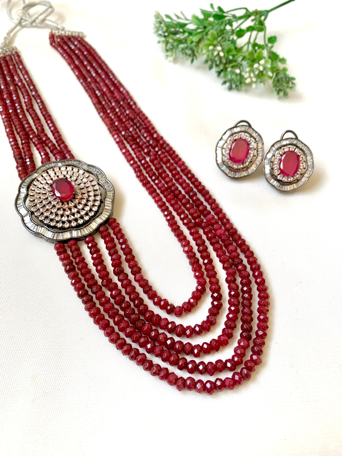 Mirey ruby onyx maala set in rhodium oxidized finish with American diamonds