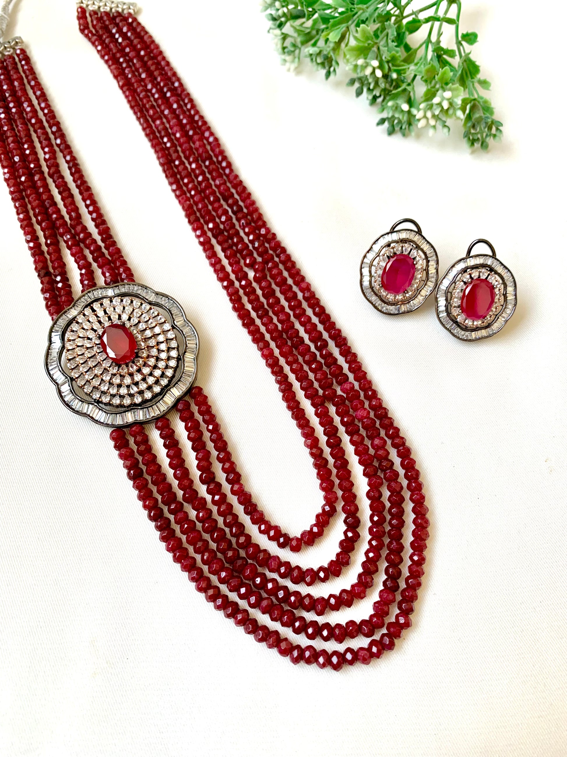 Mirey ruby onyx maala set in rhodium oxidized finish with American diamonds