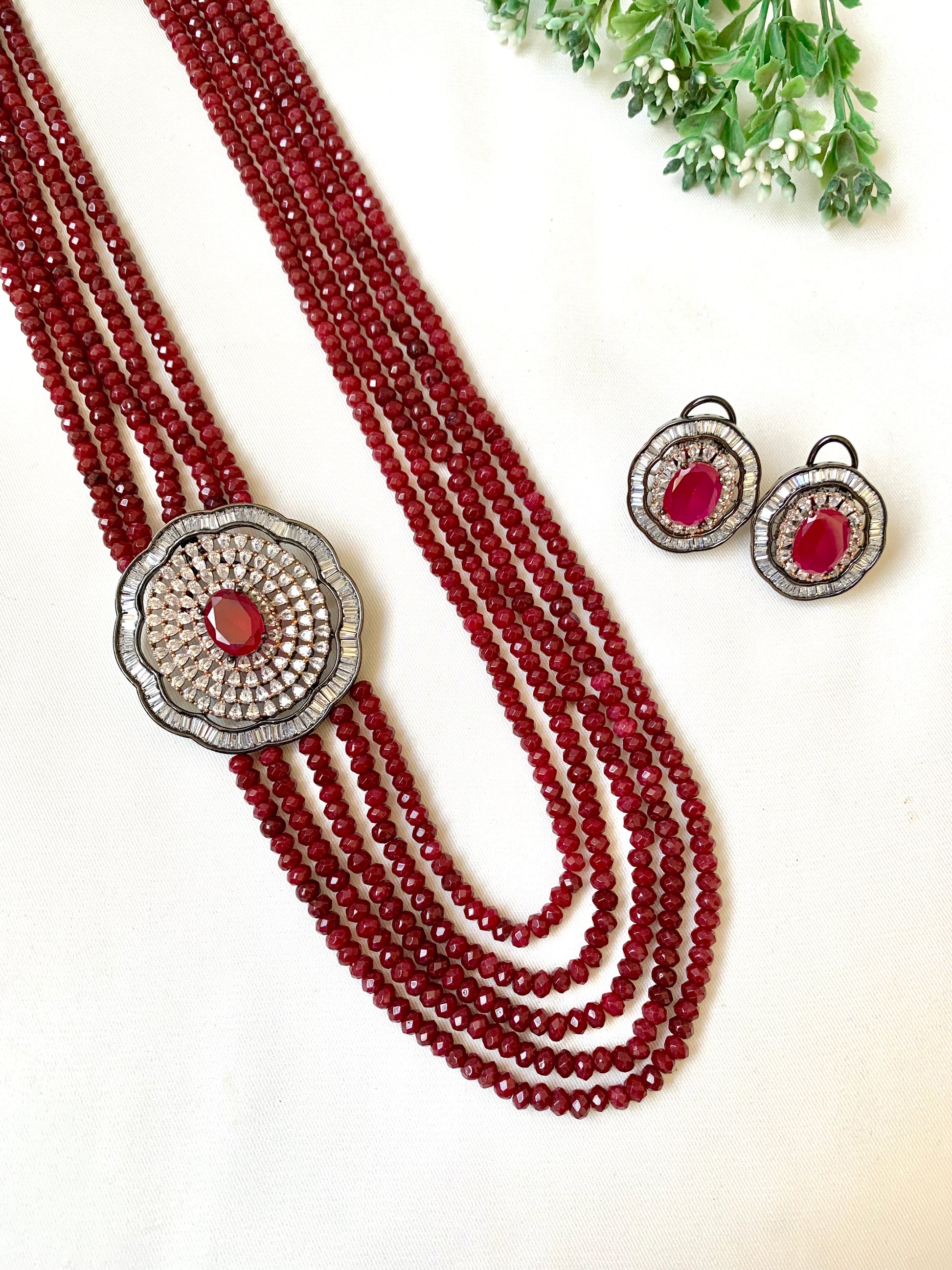 Mirey ruby onyx maala set in rhodium oxidized finish with American diamonds