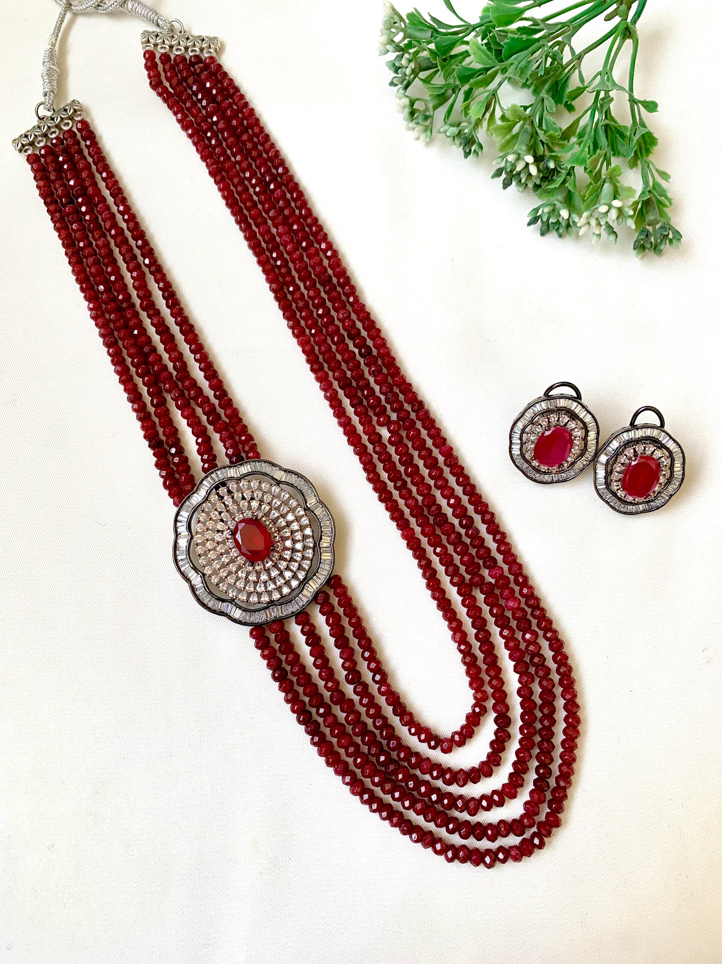 Mirey ruby onyx maala set in rhodium oxidized finish with American diamonds