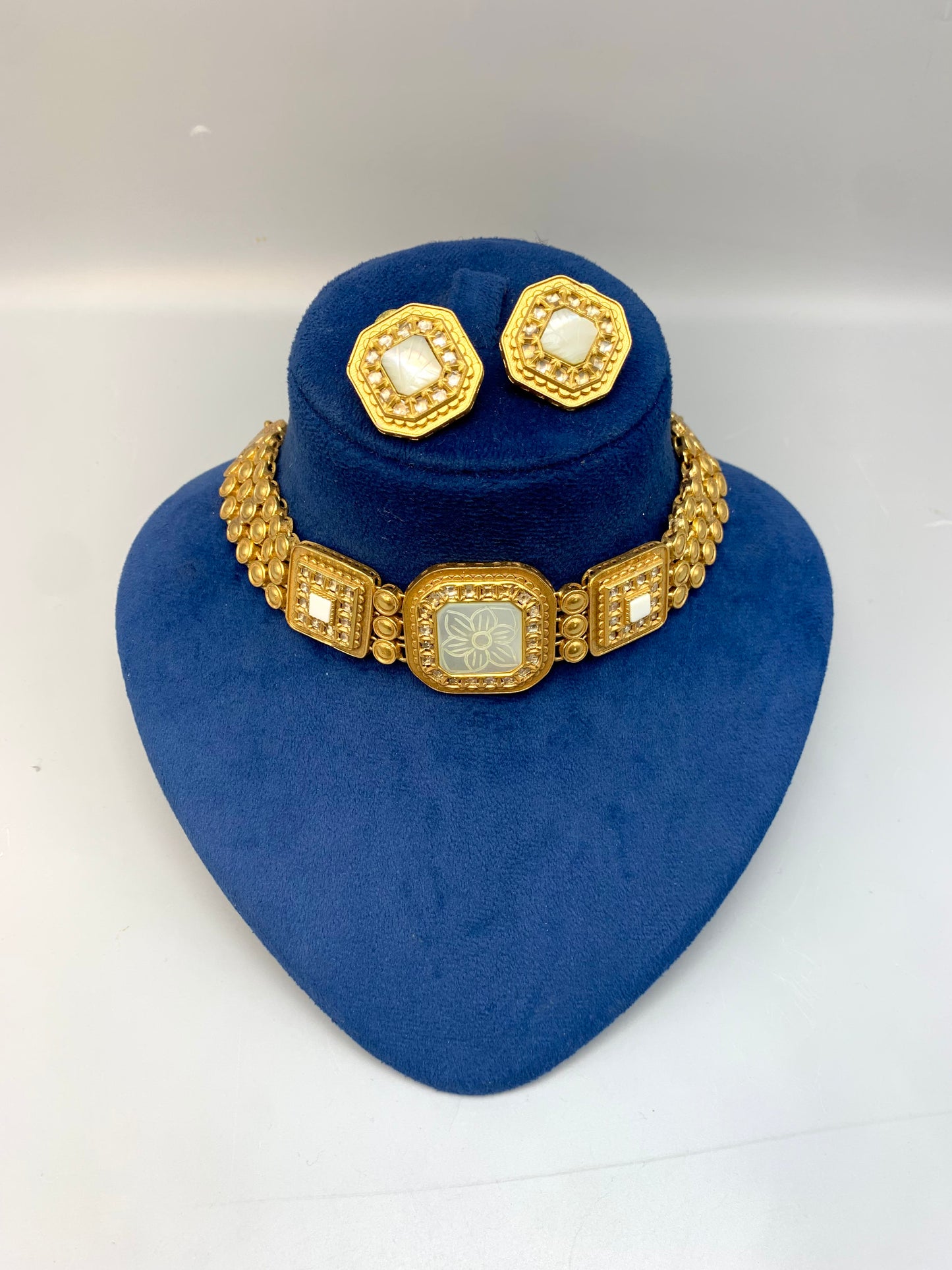 Molly handcrafted 22kt gold plated choker set with Polki Kundan and hand-carved semi-precious Mother of Pearl