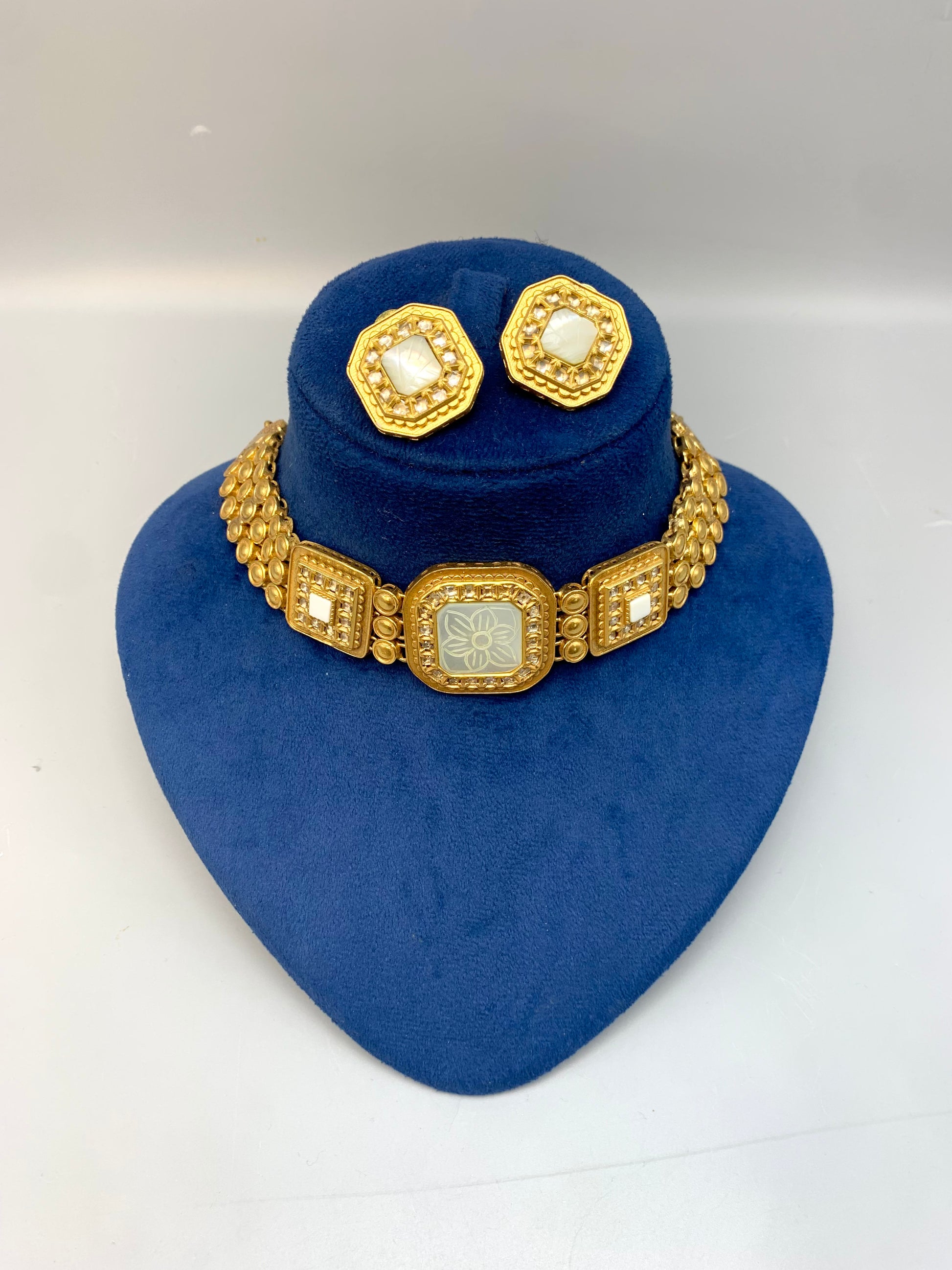 Molly handcrafted 22kt gold plated choker set with Polki Kundan and hand-carved semi-precious Mother of Pearl