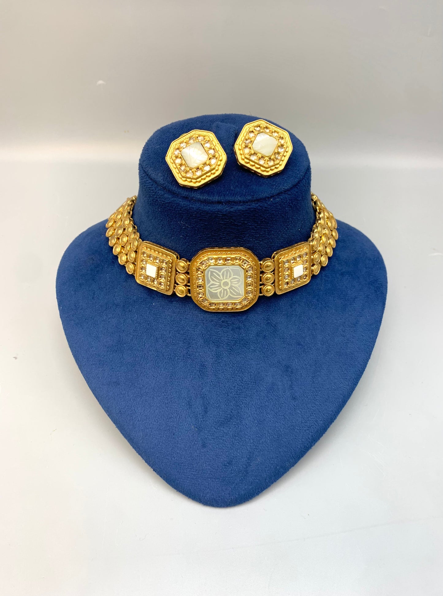 Molly handcrafted 22kt gold plated choker set with Polki Kundan and hand-carved semi-precious Mother of Pearl