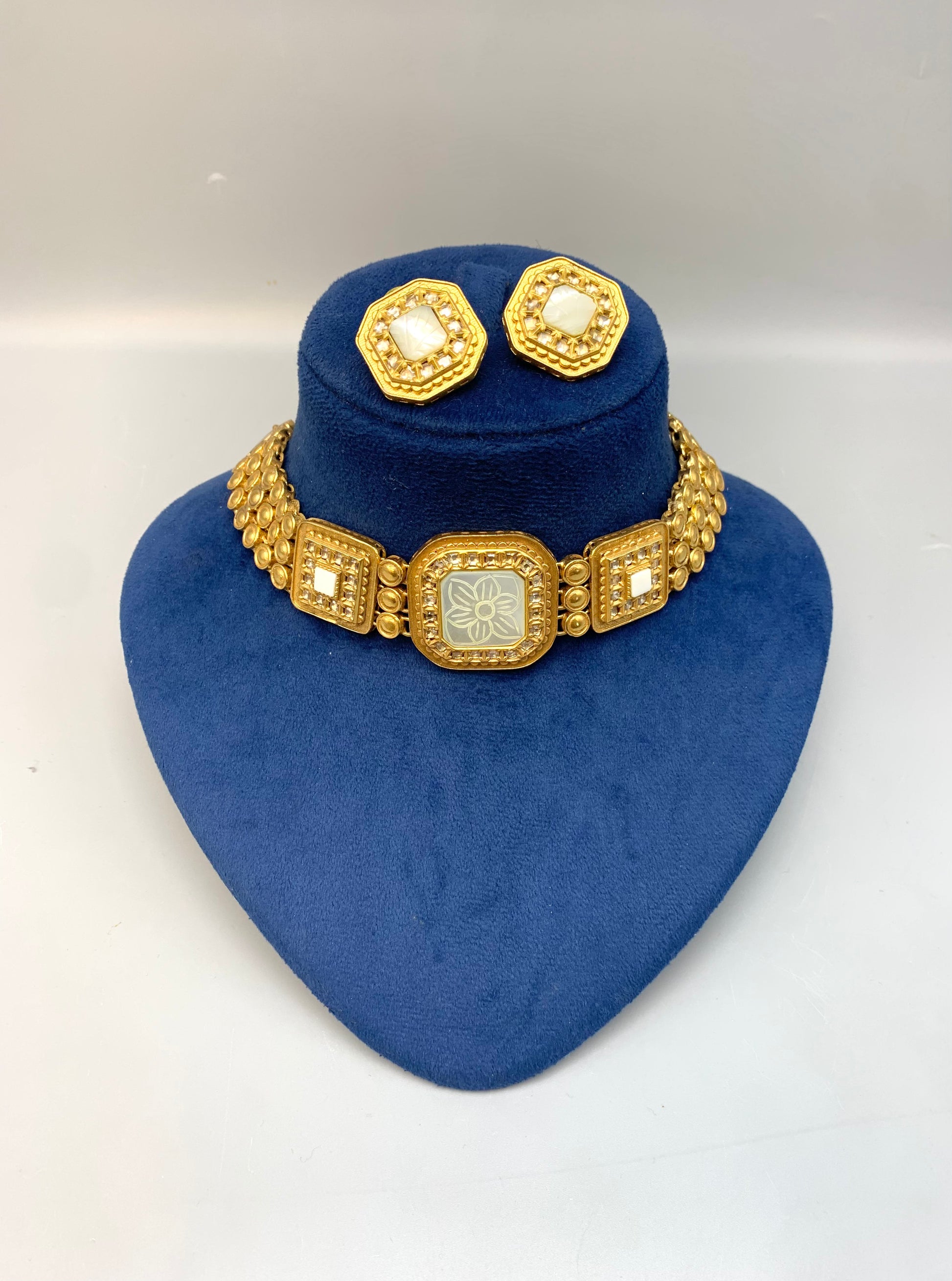 Molly handcrafted 22kt gold plated choker set with Polki Kundan and hand-carved semi-precious Mother of Pearl