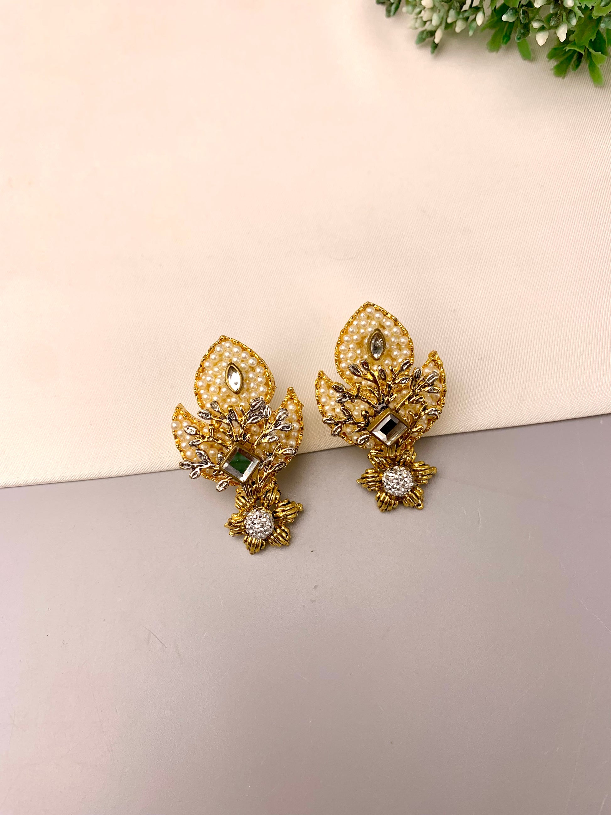 Naghma handcrafted 22kt gold plated earrings featuring American Diamonds, Kundan and semi-precious Pearls