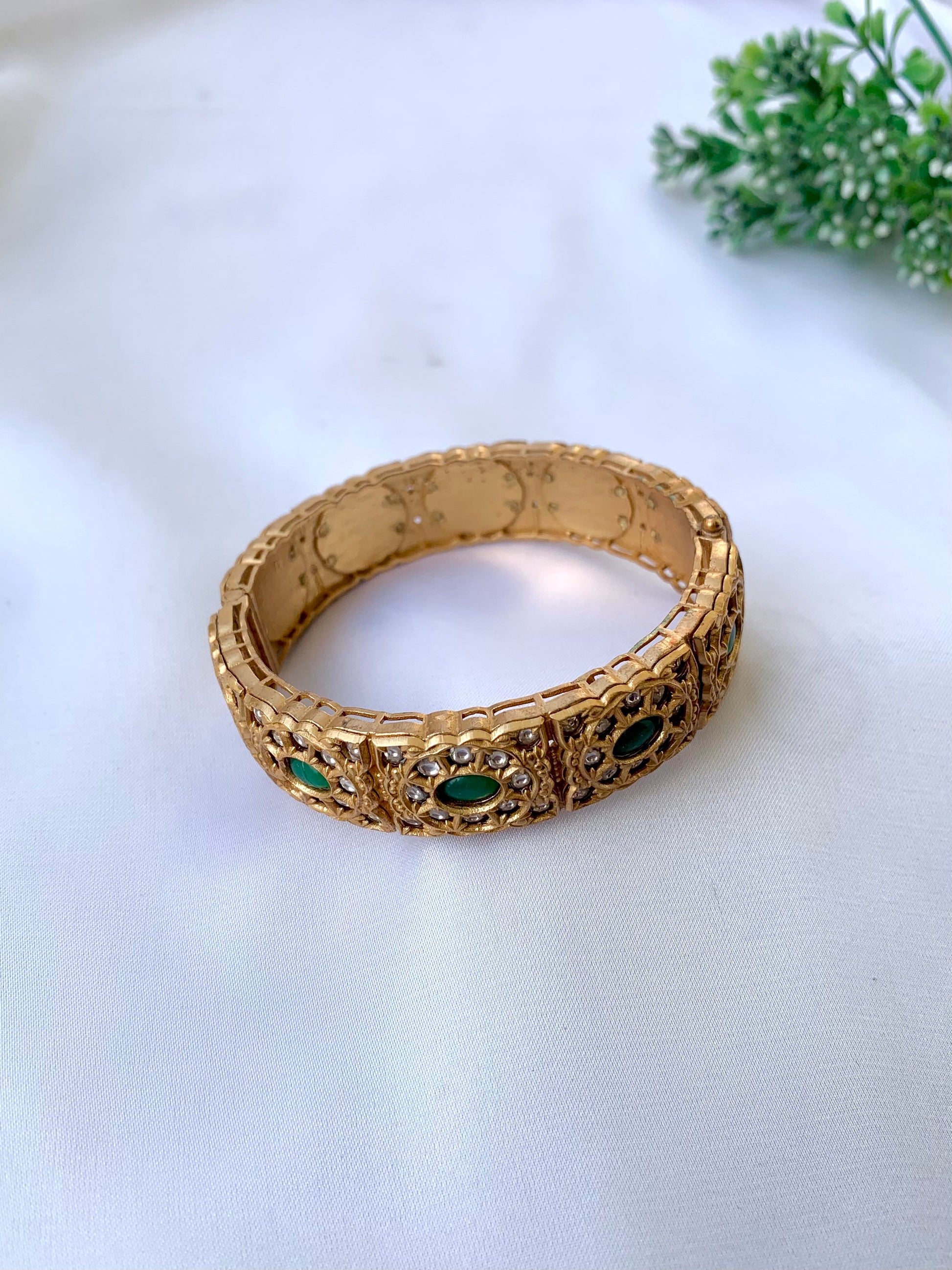 Nazaha emerald moissanite kundan bangle in victorian gold plating with openable screw design