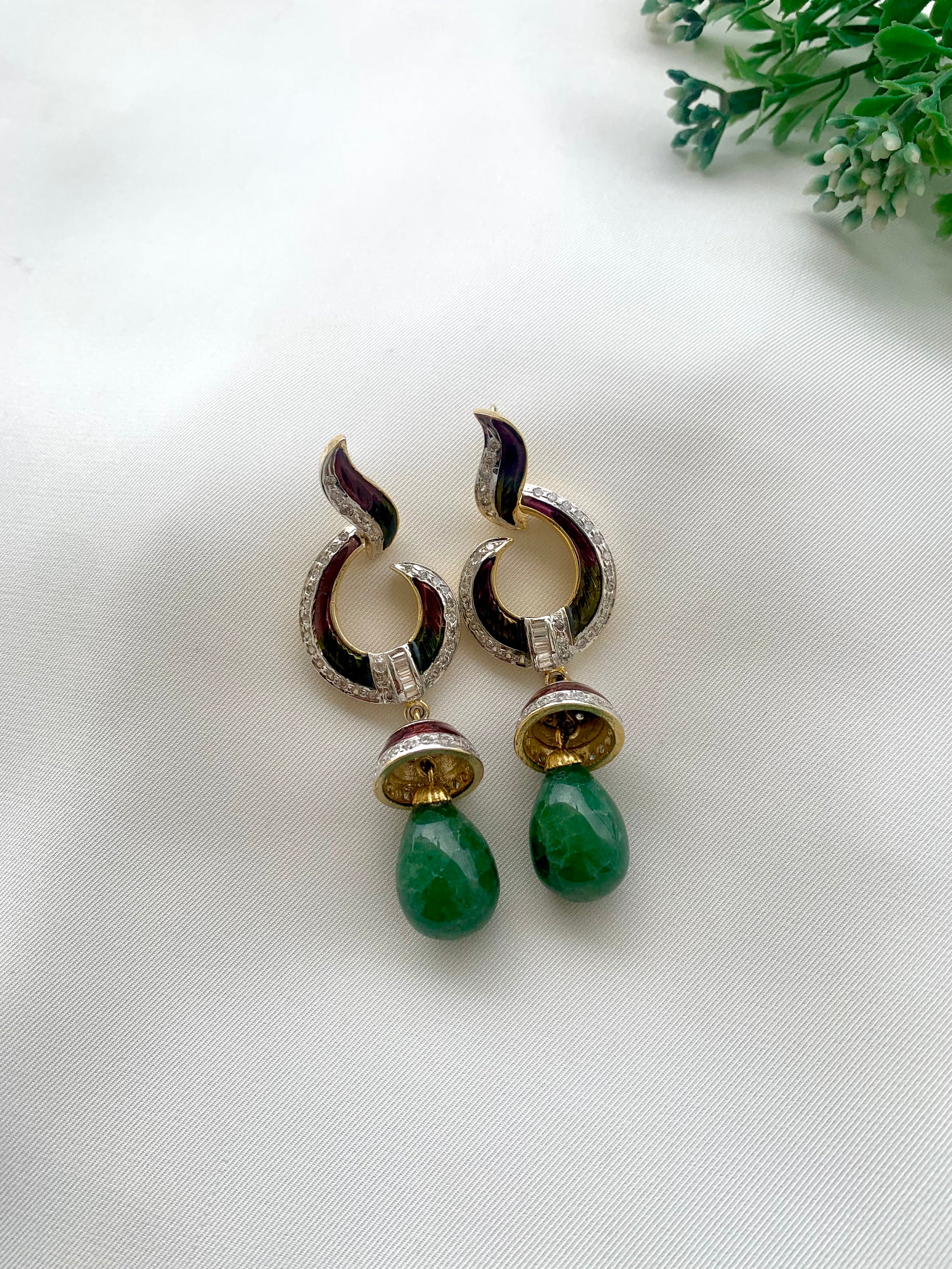 Neelam handcrafted 22kt gold plated earrings with American Diamonds, semi-precious Emeralds and hand-painted Meena