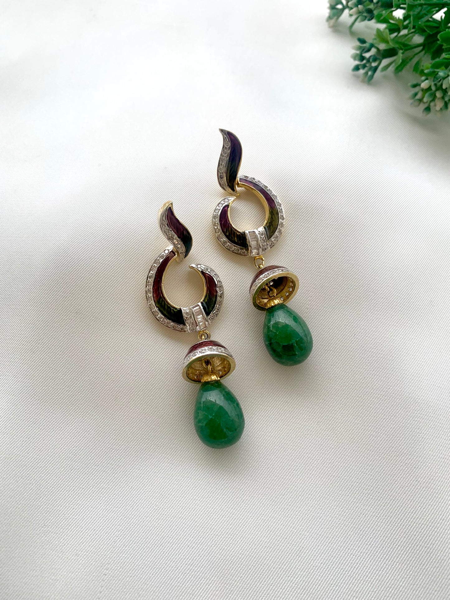 Neelam handcrafted 22kt gold plated earrings with American Diamonds, semi-precious Emeralds and hand-painted Meena
