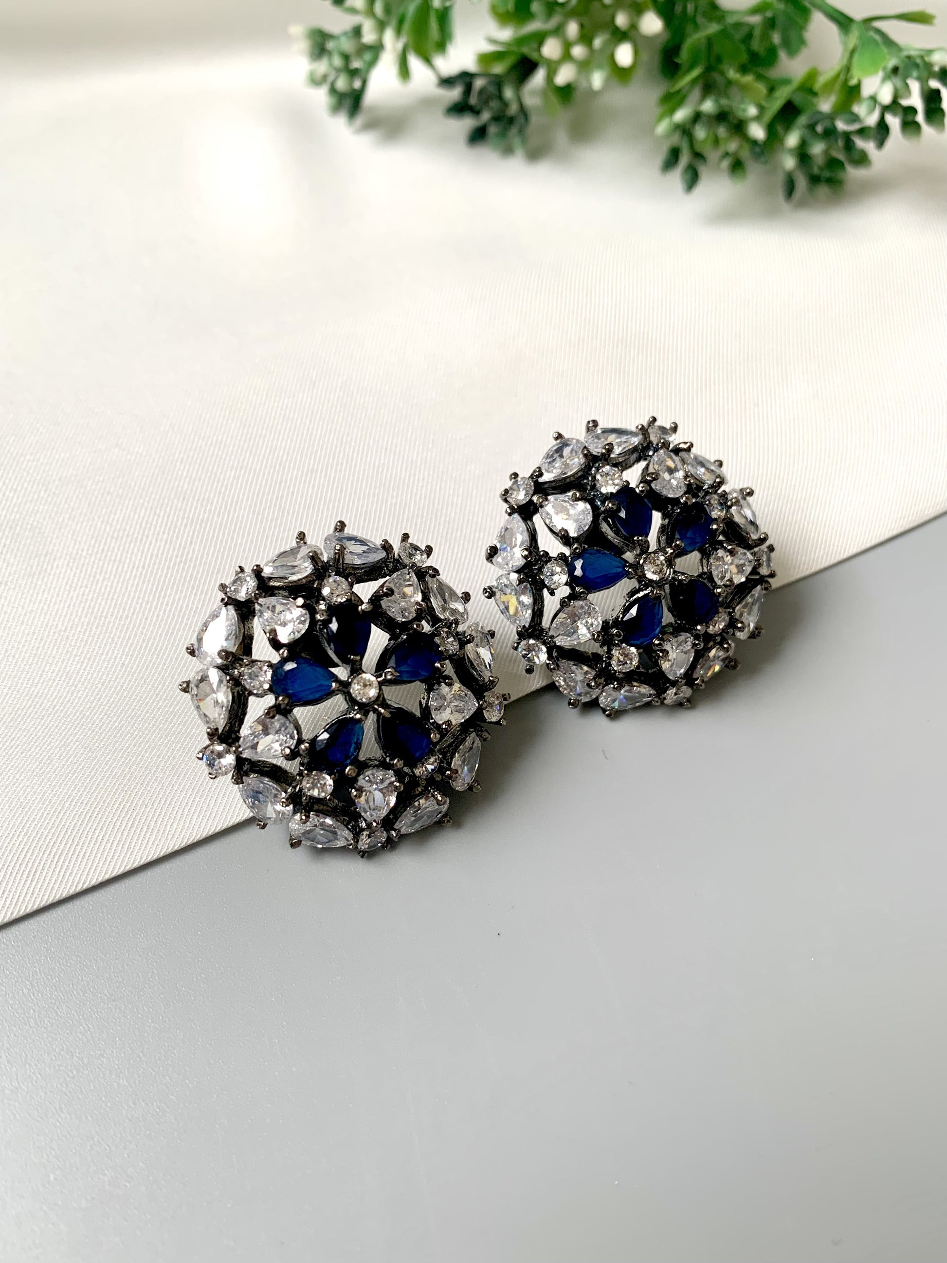Rhodium plated oxidized finish studs with American Diamonds and Semi-Precious Sapphire from Zamal Jewels