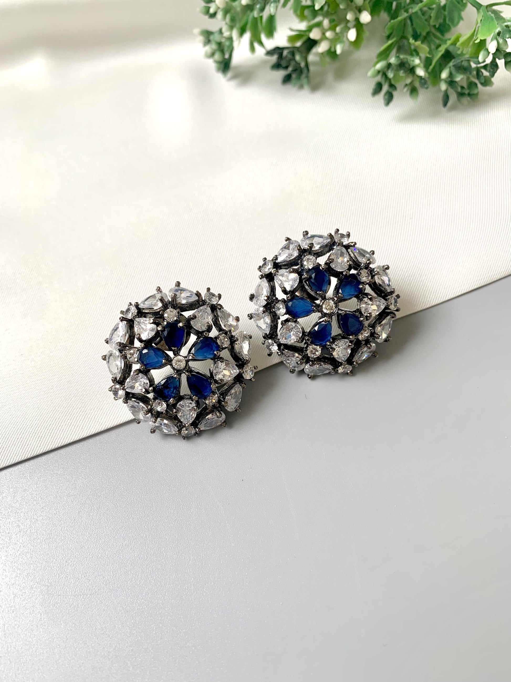 Rhodium plated oxidized finish studs with American Diamonds and Semi-Precious Sapphire from Zamal Jewels