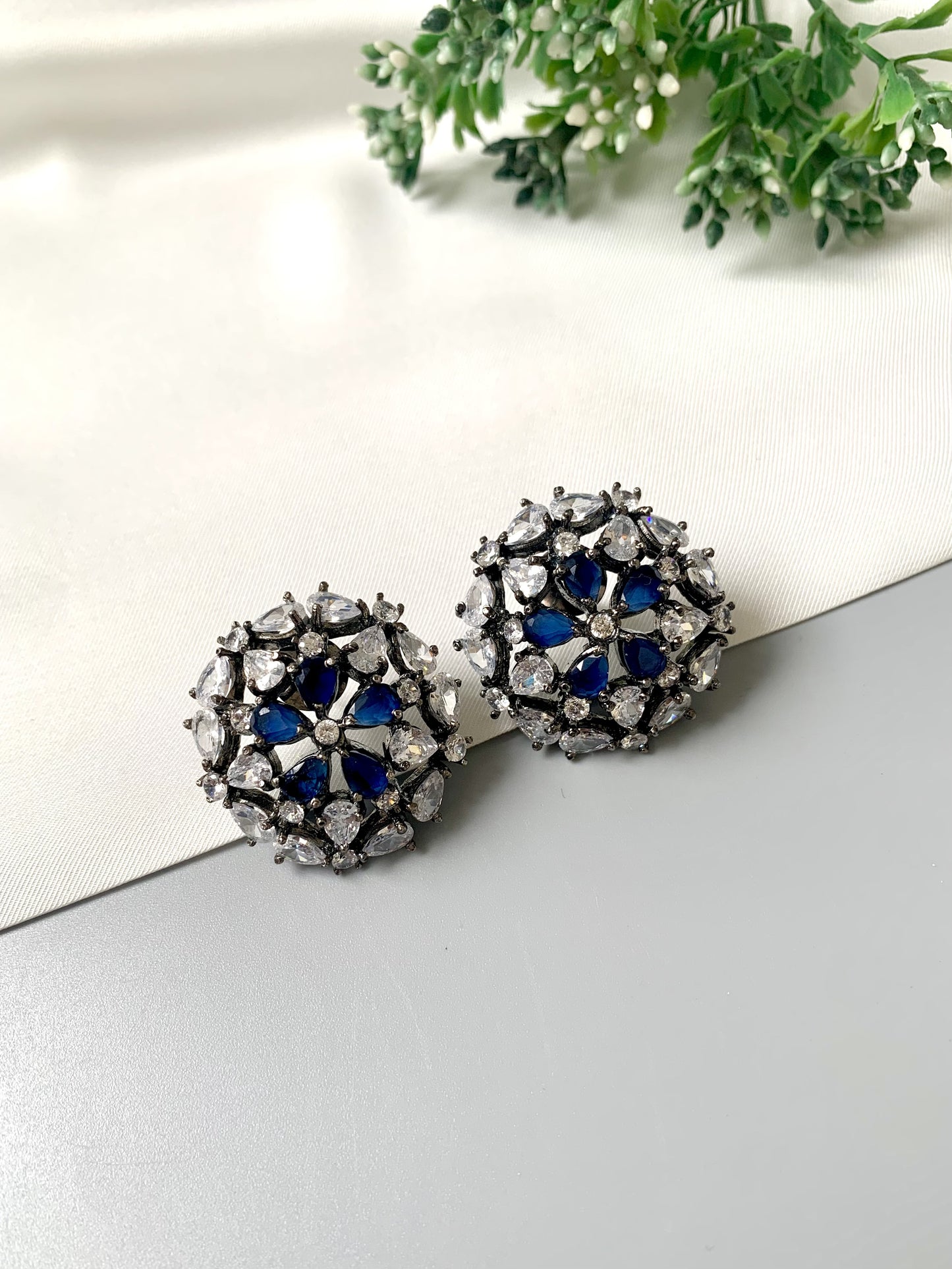 Rhodium plated oxidized finish studs with American Diamonds and Semi-Precious Sapphire from Zamal Jewels