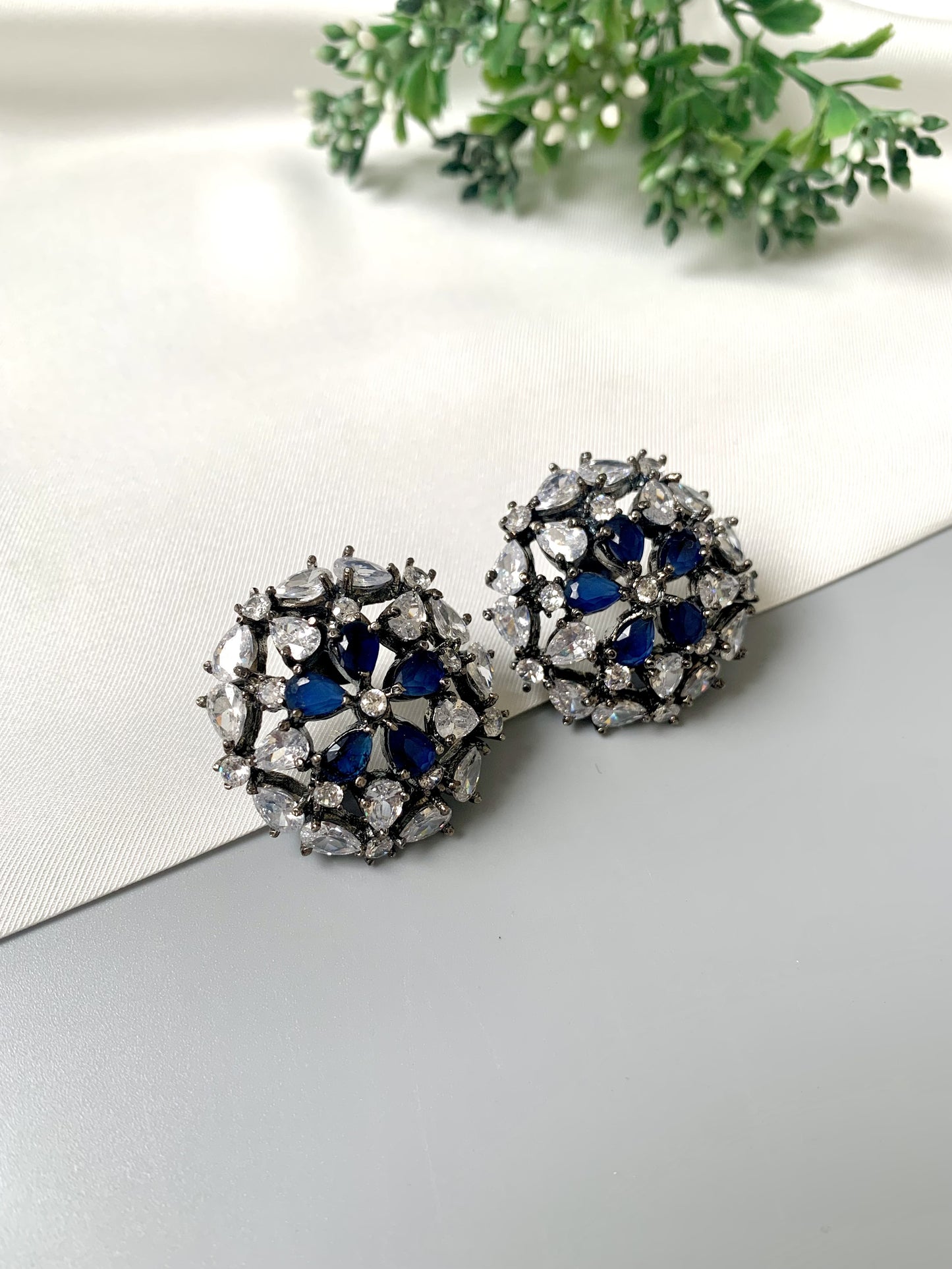 Rhodium plated oxidized finish studs with American Diamonds and Semi-Precious Sapphire from Zamal Jewels