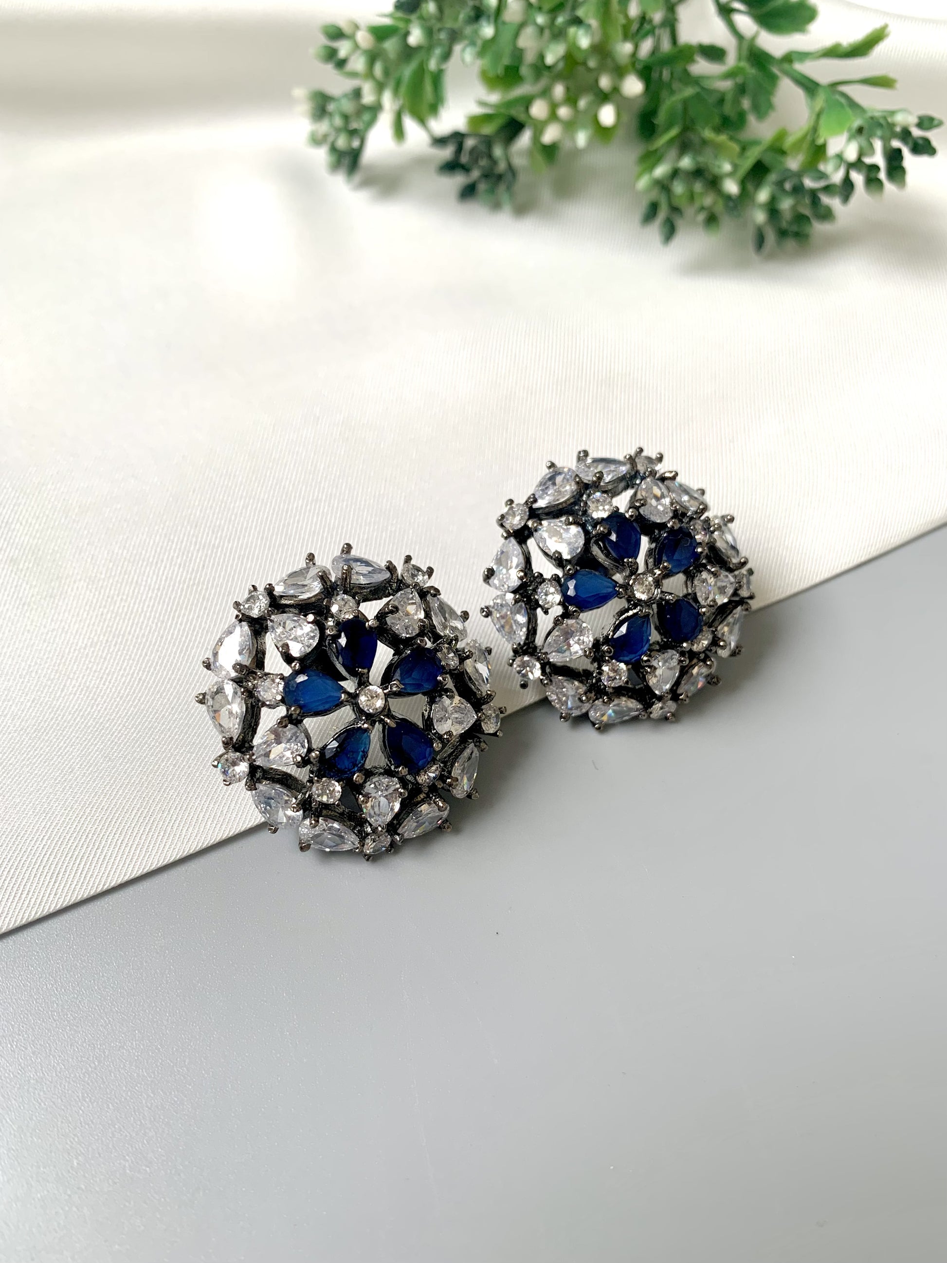 Rhodium plated oxidized finish studs with American Diamonds and Semi-Precious Sapphire from Zamal Jewels