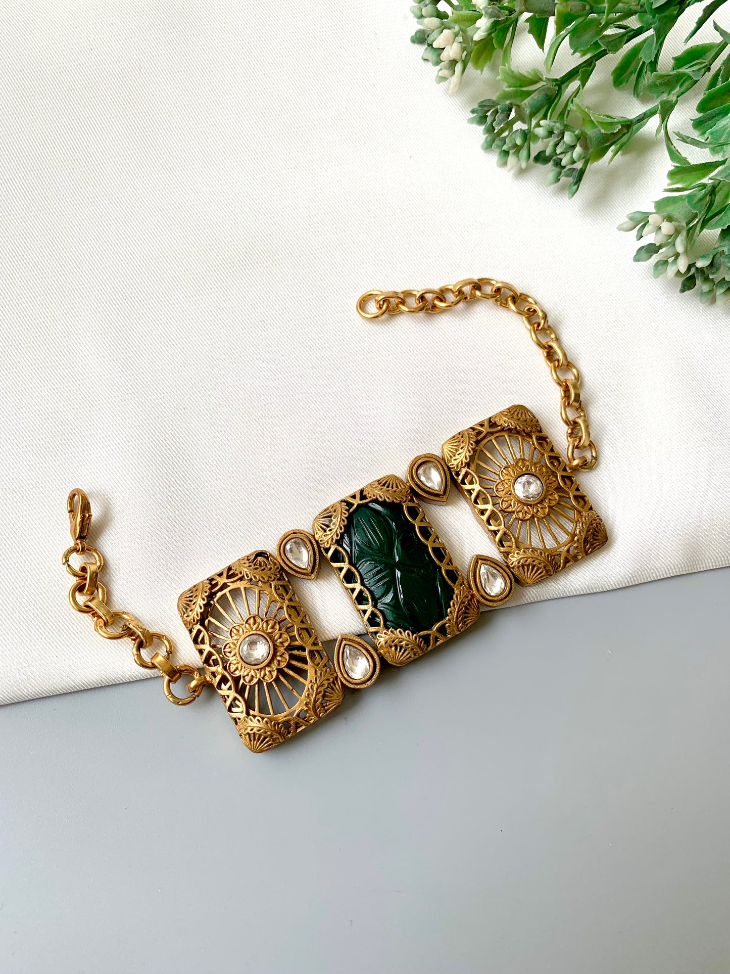 Parishay emerald kundan bracelet in victorian rose gold plating with hand carved gemstone