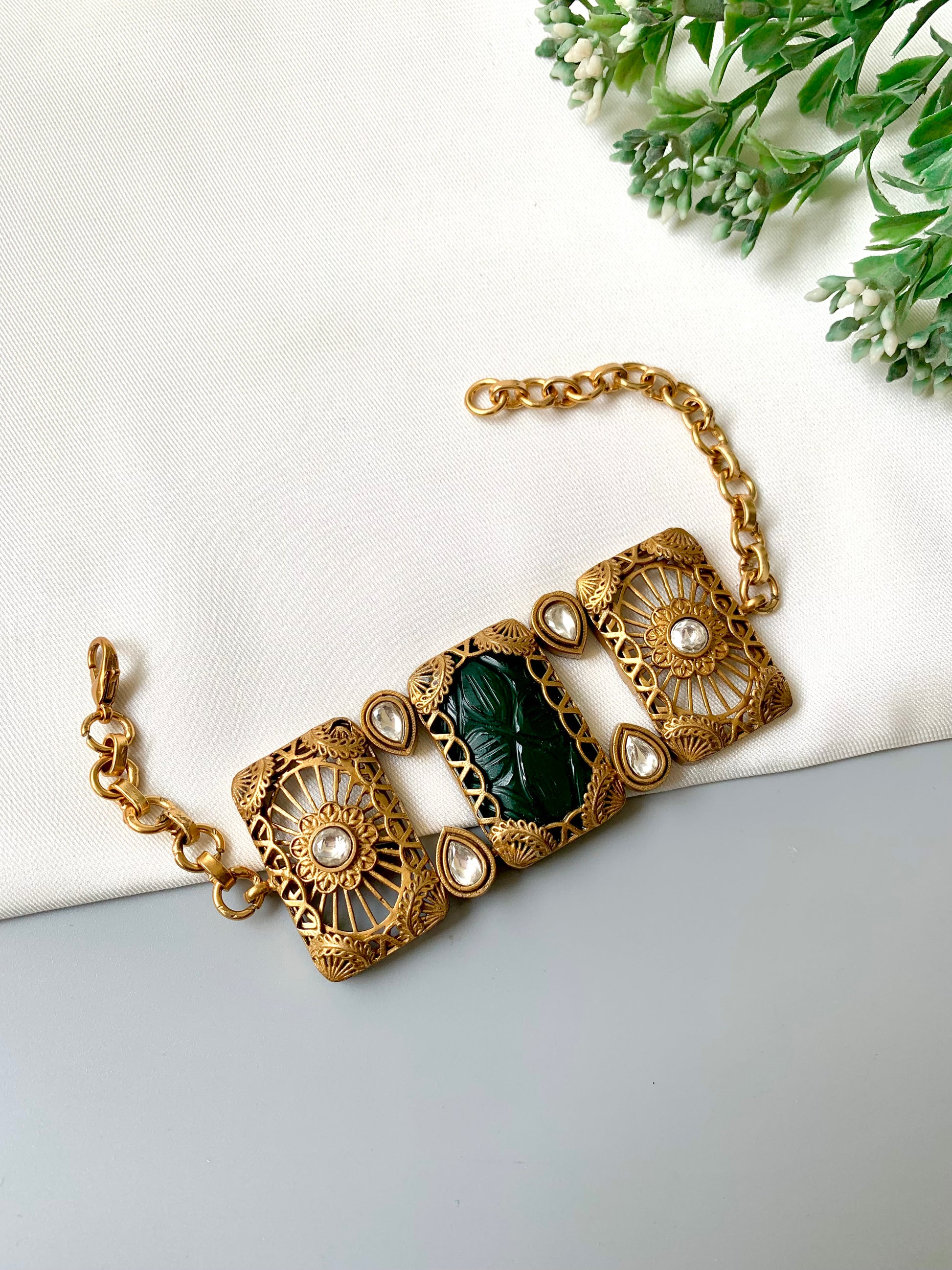 Parishay emerald kundan bracelet in victorian rose gold plating with hand carved gemstone