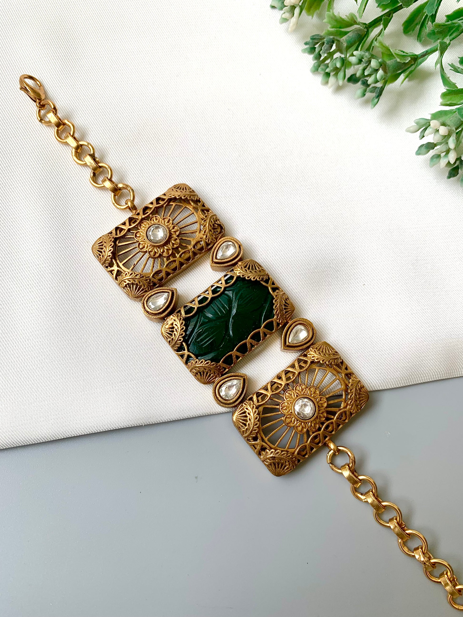 Parishay emerald kundan bracelet in victorian rose gold plating with hand carved gemstone