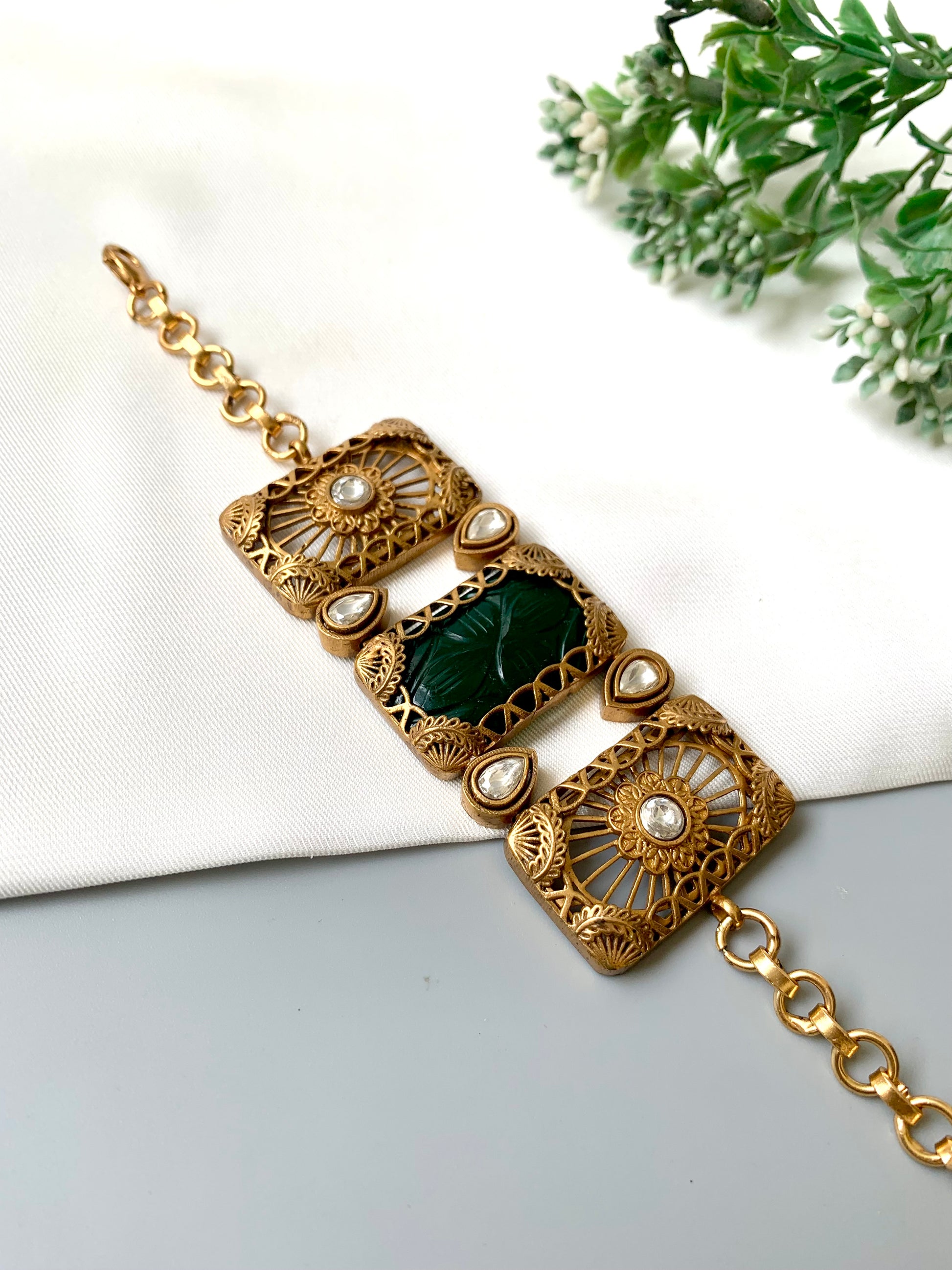 Parishay emerald kundan bracelet in victorian rose gold plating with hand carved gemstone