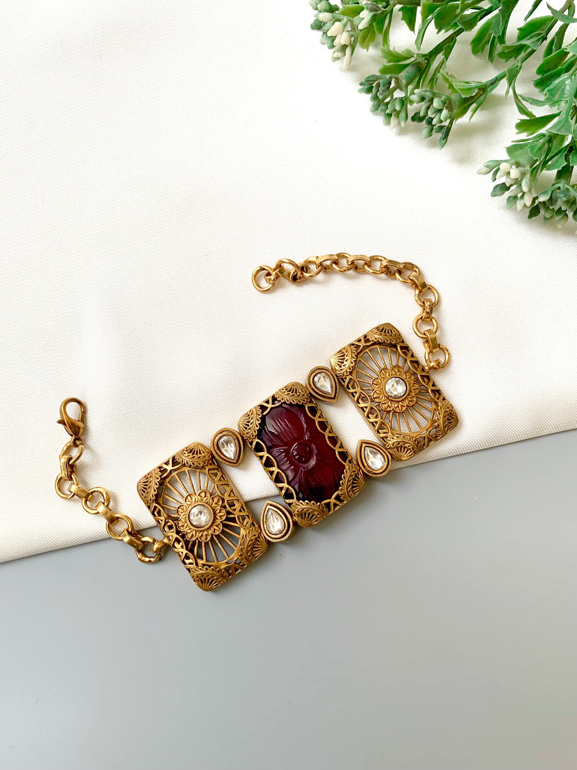 Parishay ruby kundan bracelet in victorian rose gold plating with hand carved gemstone