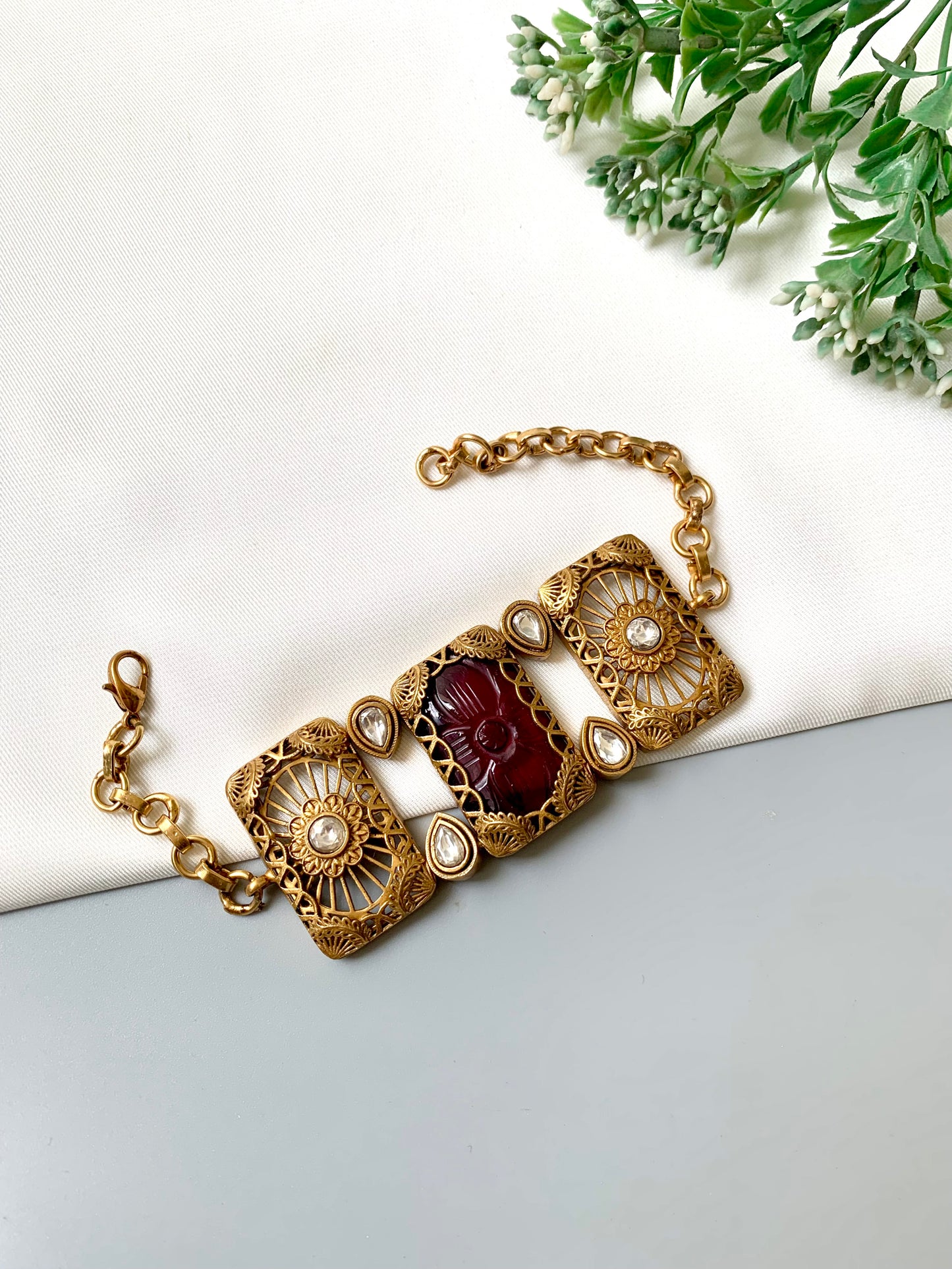 Parishay ruby kundan bracelet in victorian rose gold plating with hand carved gemstone