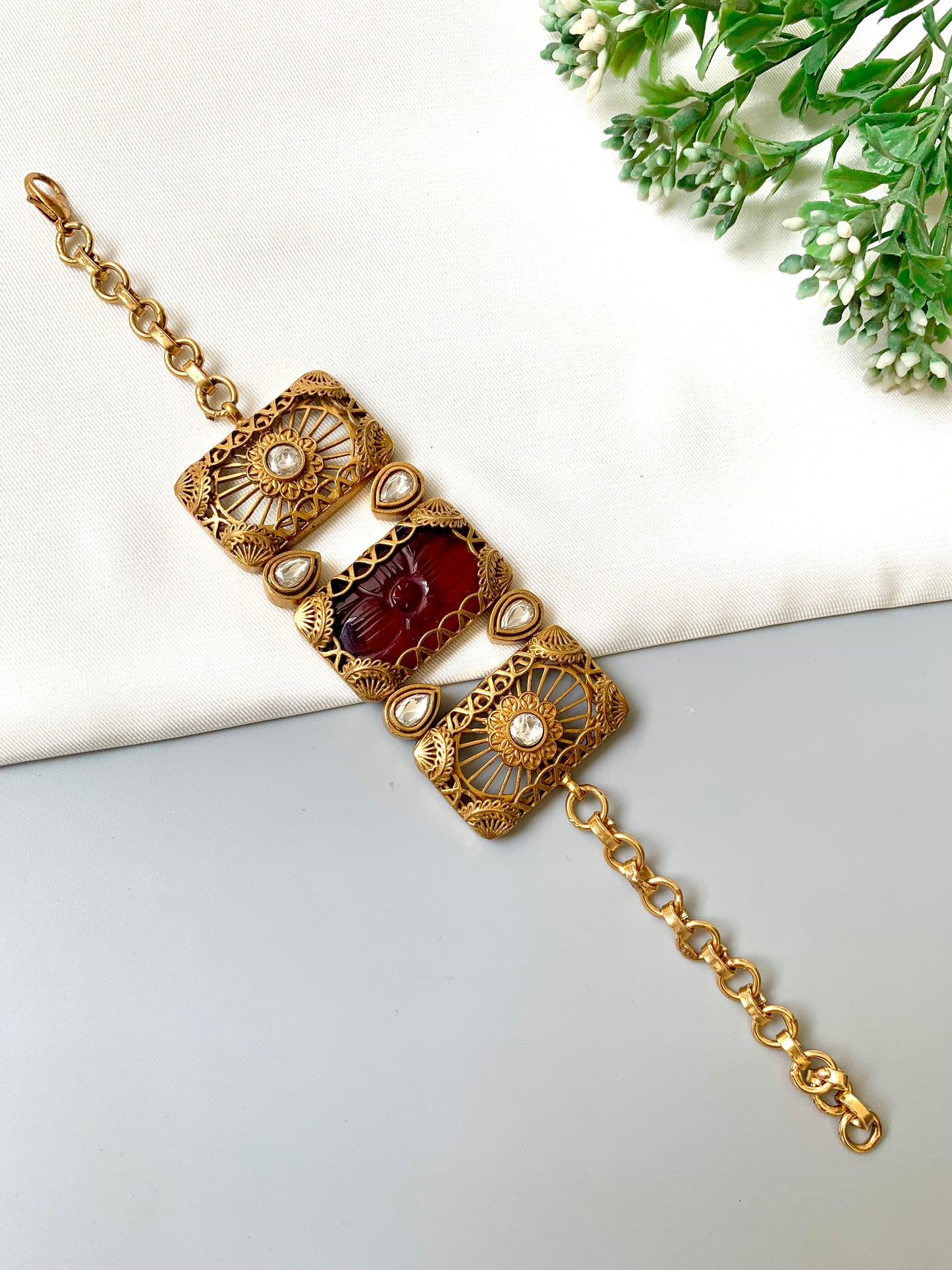 Parishay ruby kundan bracelet in victorian rose gold plating with hand carved gemstone