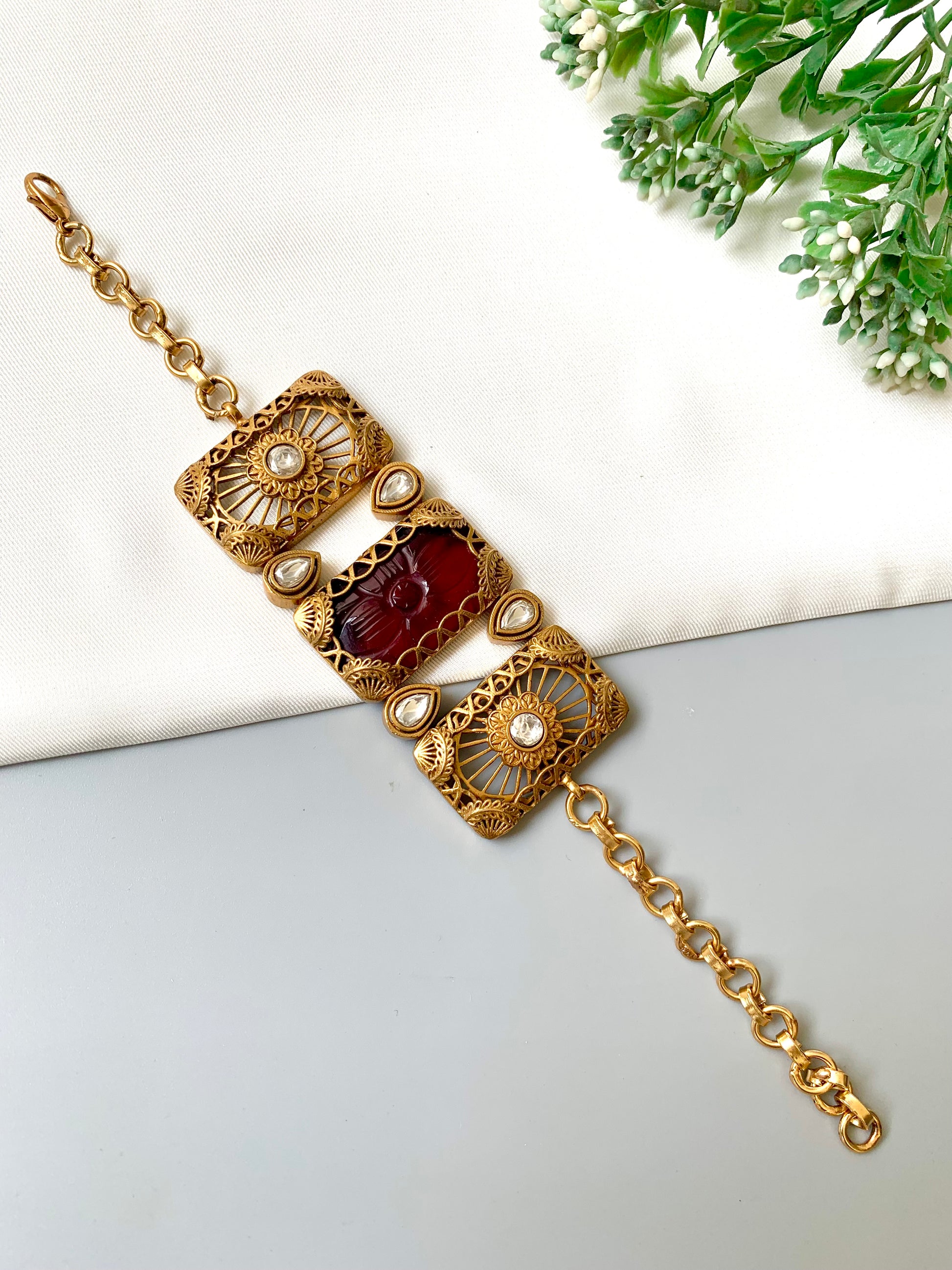 Parishay ruby kundan bracelet in victorian rose gold plating with hand carved gemstone