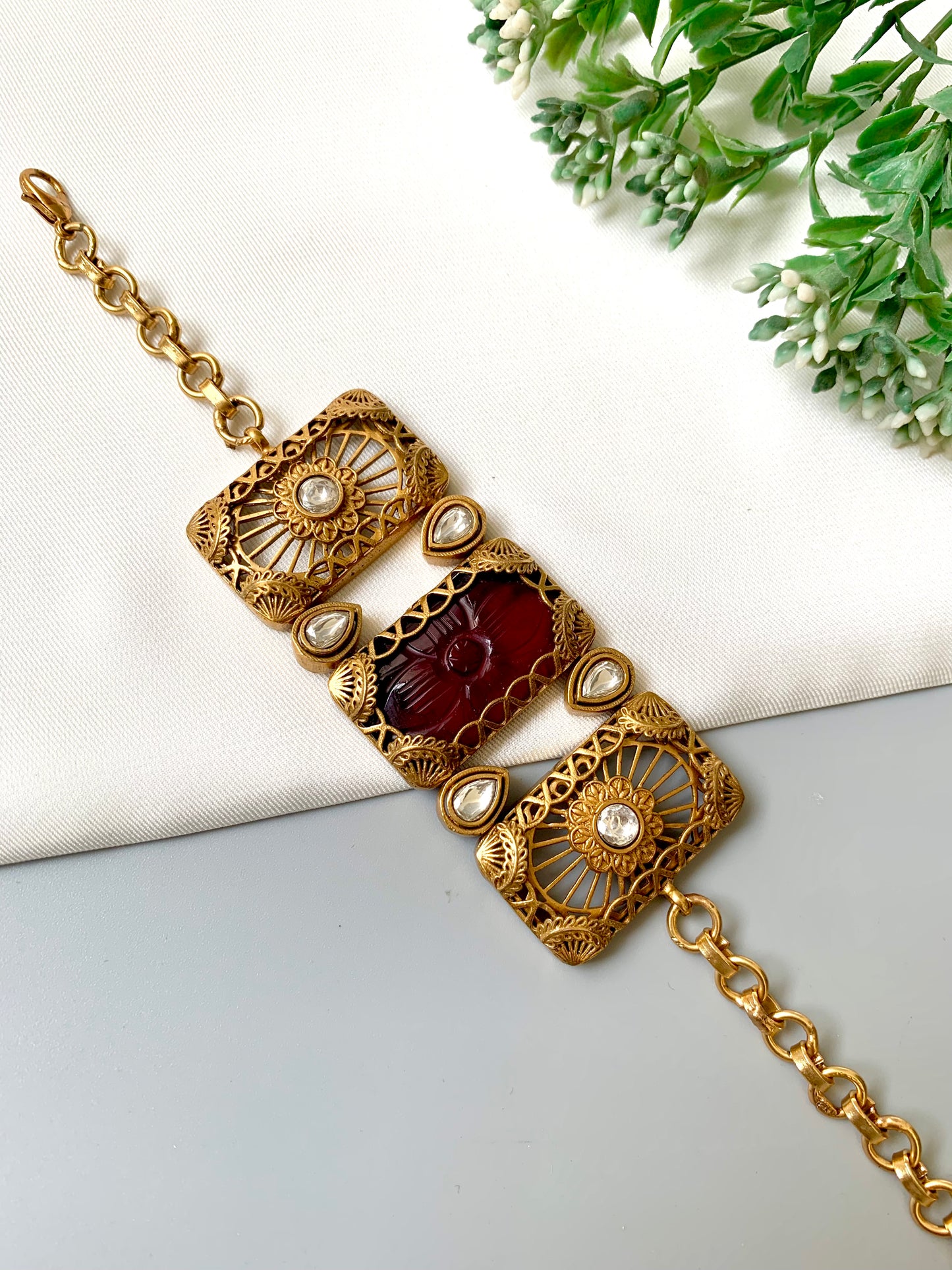 Parishay ruby kundan bracelet in victorian rose gold plating with hand carved gemstone