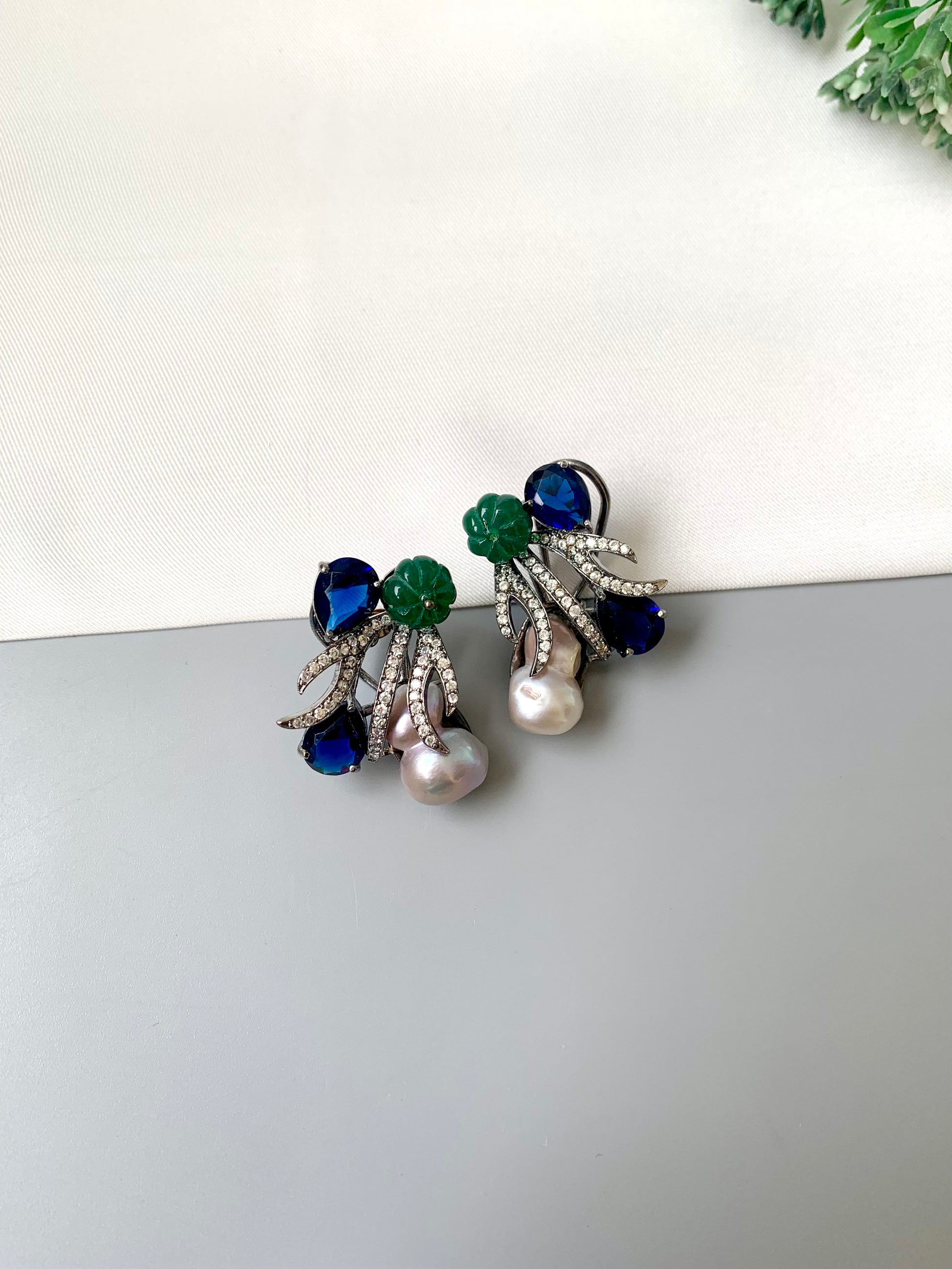 Petra sapphire baroque pearl studs in rhodium oxidized finish with melon beads and American diamonds