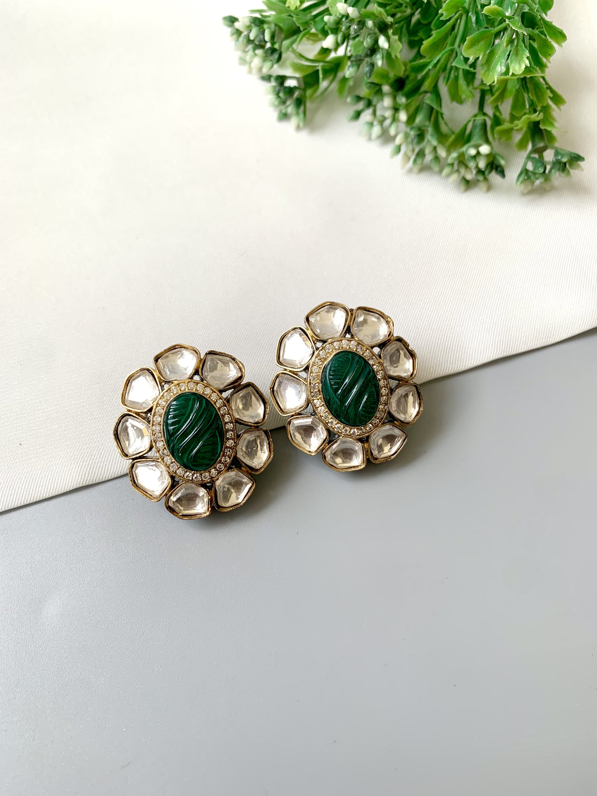 Nayab Emerald Studs with hand-carved Emerald, Polki Kundan, and American Diamonds in 22kt Victorian gold plating by Zamal Jewels