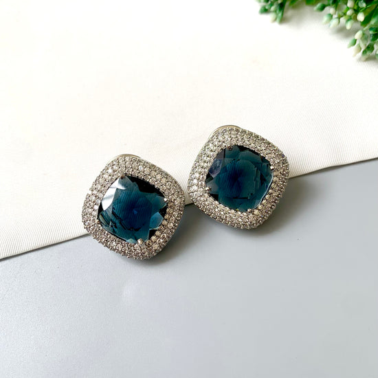 Selara Sapphire Studs with Swarovski Sapphire crystal and American Diamond halo by Zamal Jewels