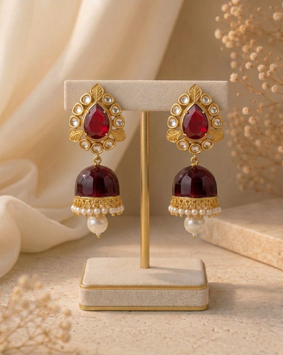 Seren handcrafted 22kt gold plated Jhumka featuring Polki Kundan, semi-precious Ruby and Pearls