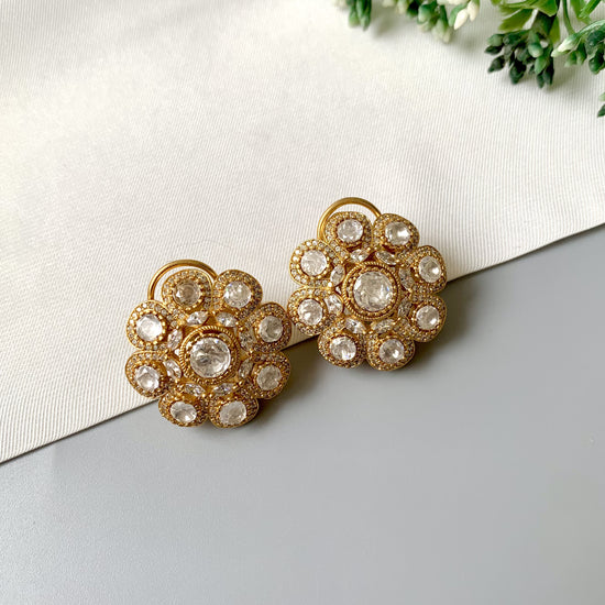 Video of Mehra floral studs with Moissanite diamonds and 22kt gold finish by Zamal Jewels