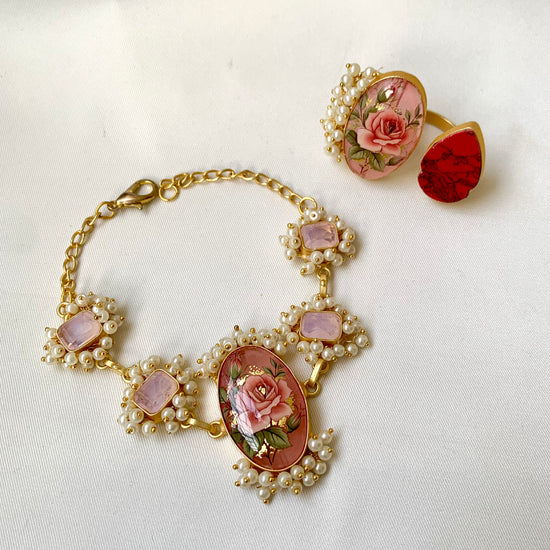 Shehnai Combo Set featuring handcrafted gold plated bracelet and adjustable ring with pearls, ruby and hand painted Tansa beads