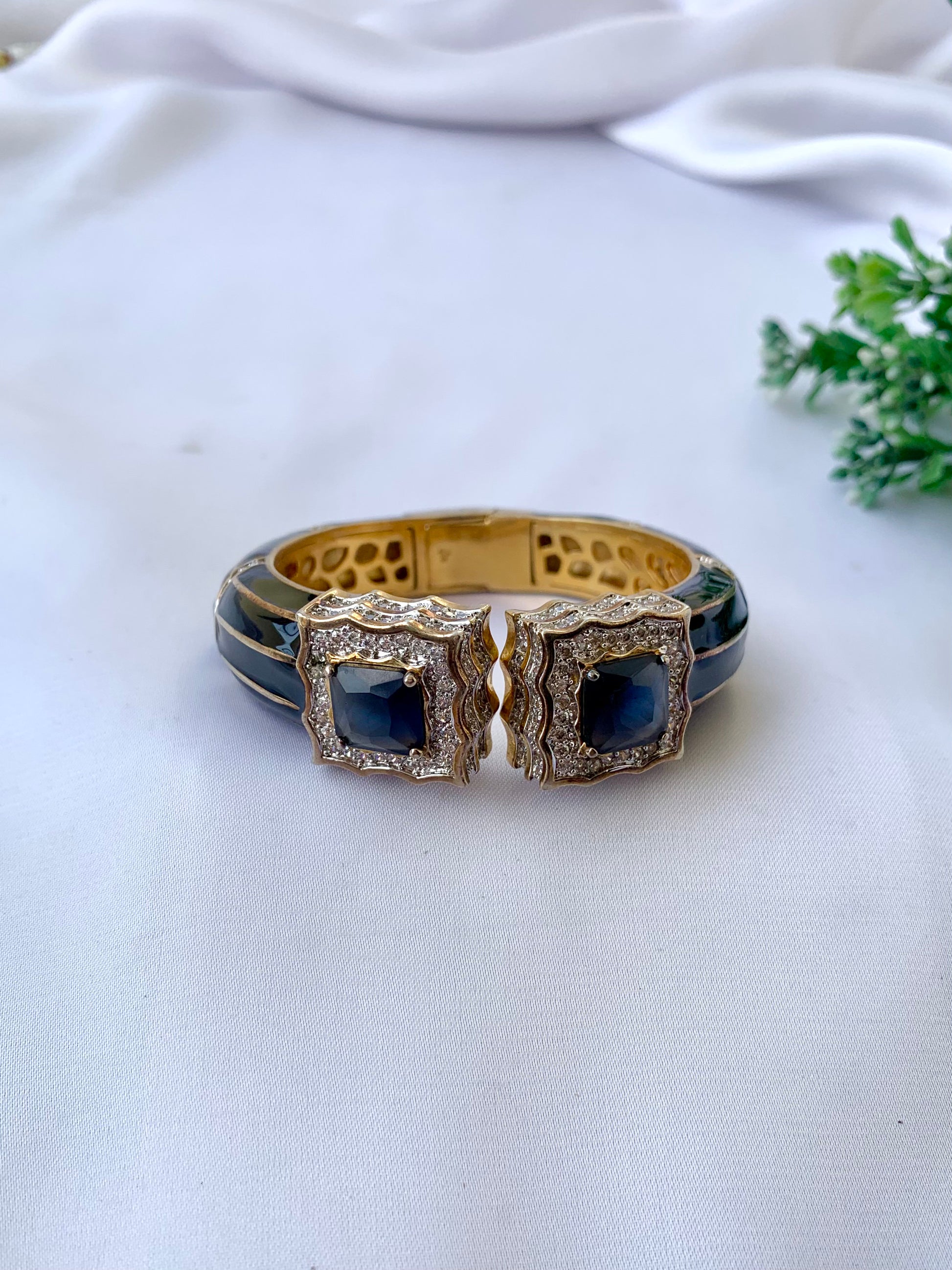 Railey designer bangle in 22kt gold plating with American diamonds, sapphire stones and hand painted meena