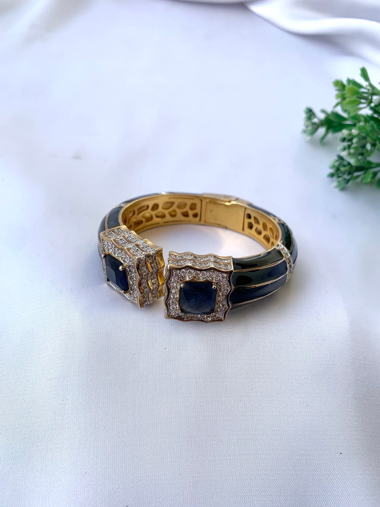 Railey designer bangle in 22kt gold plating with American diamonds, sapphire stones and hand painted meena
