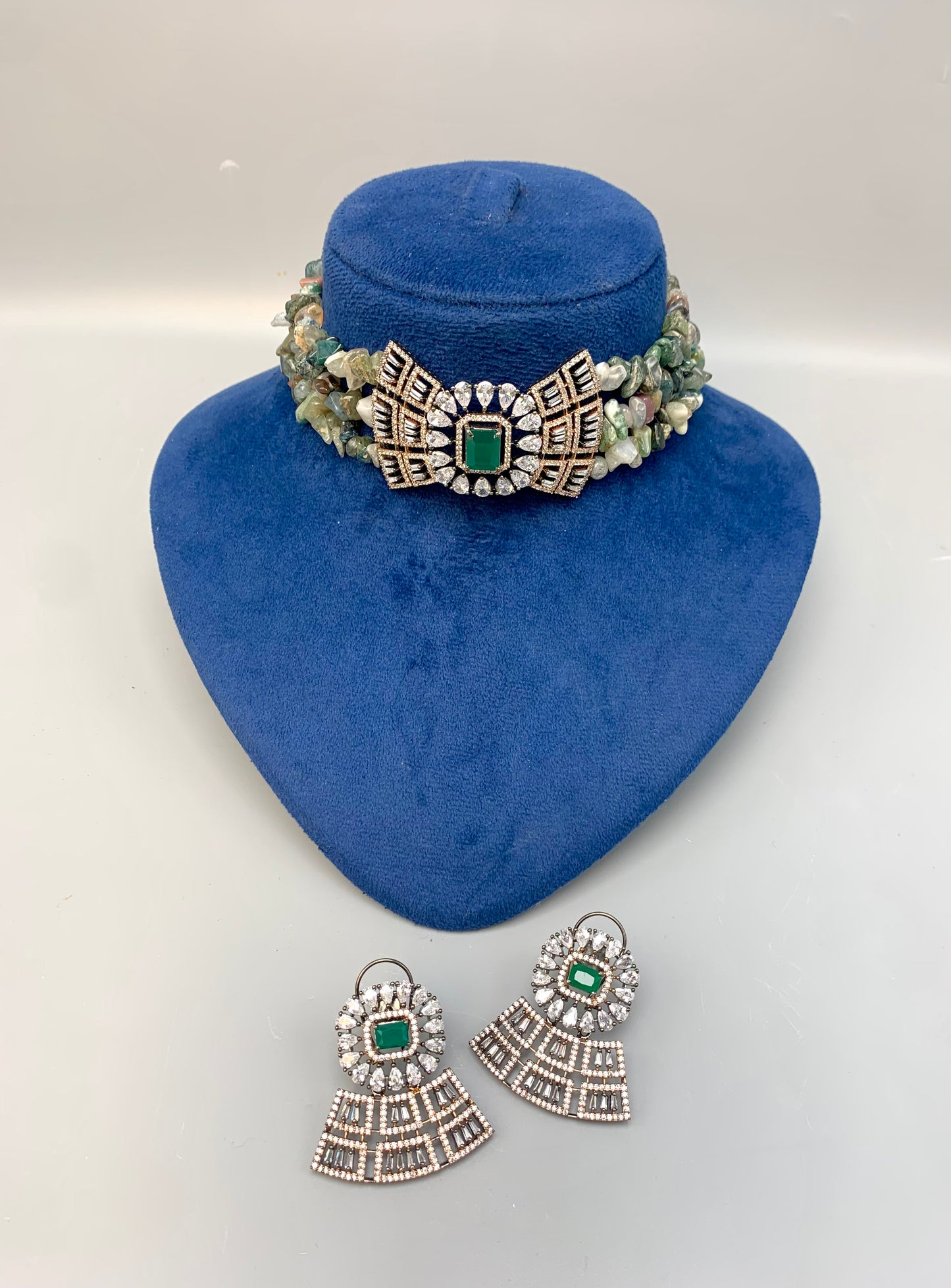 Ramisha handcrafted 22kt rose gold plated choker set with American diamonds, semi-precious emeralds and natural gemstones
