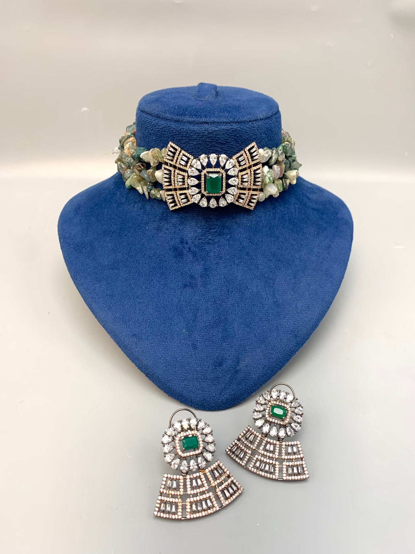 Ramisha handcrafted 22kt rose gold plated choker set with American diamonds, semi-precious emeralds and natural gemstones