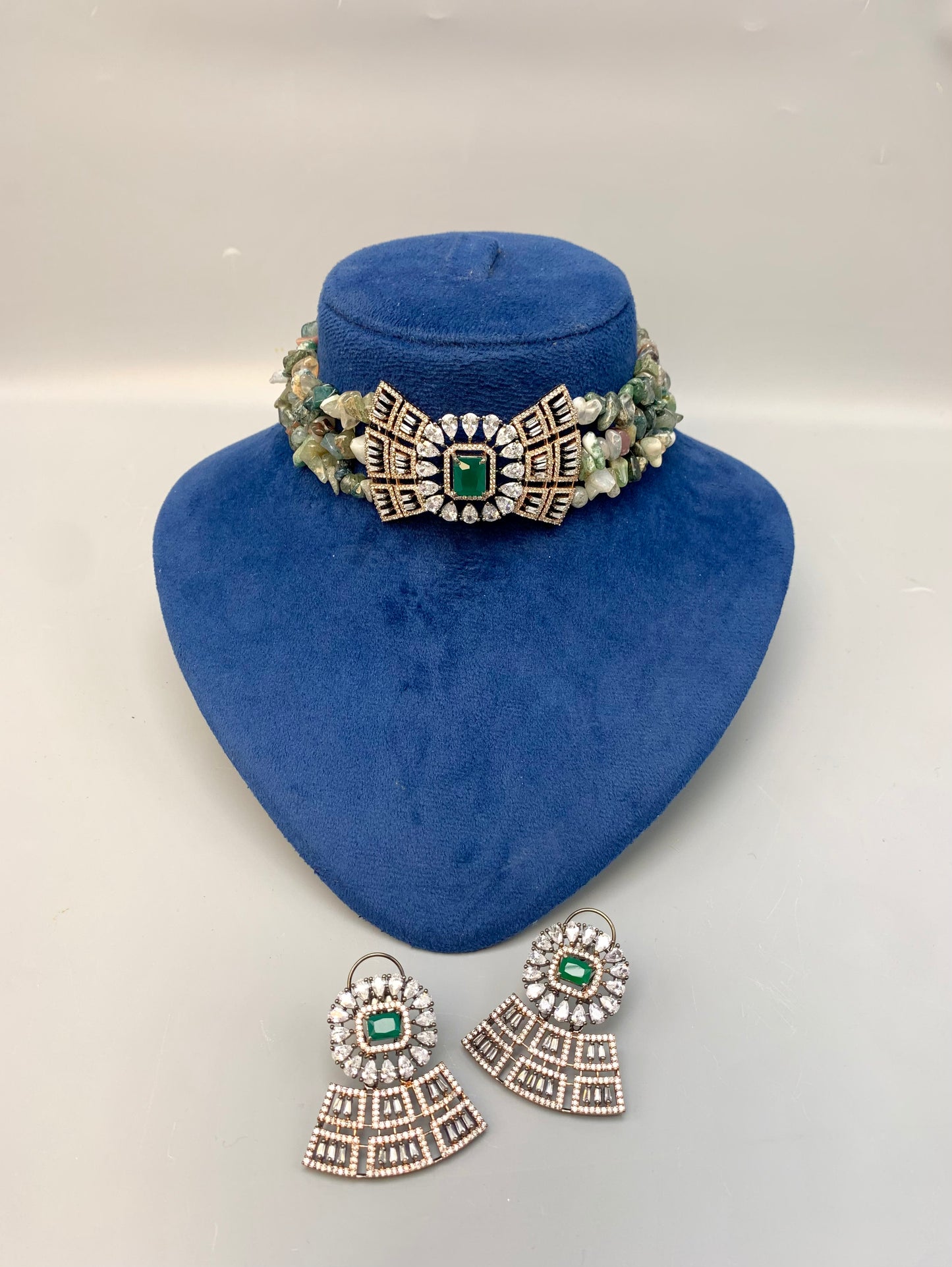 Ramisha handcrafted 22kt rose gold plated choker set with American diamonds, semi-precious emeralds and natural gemstones