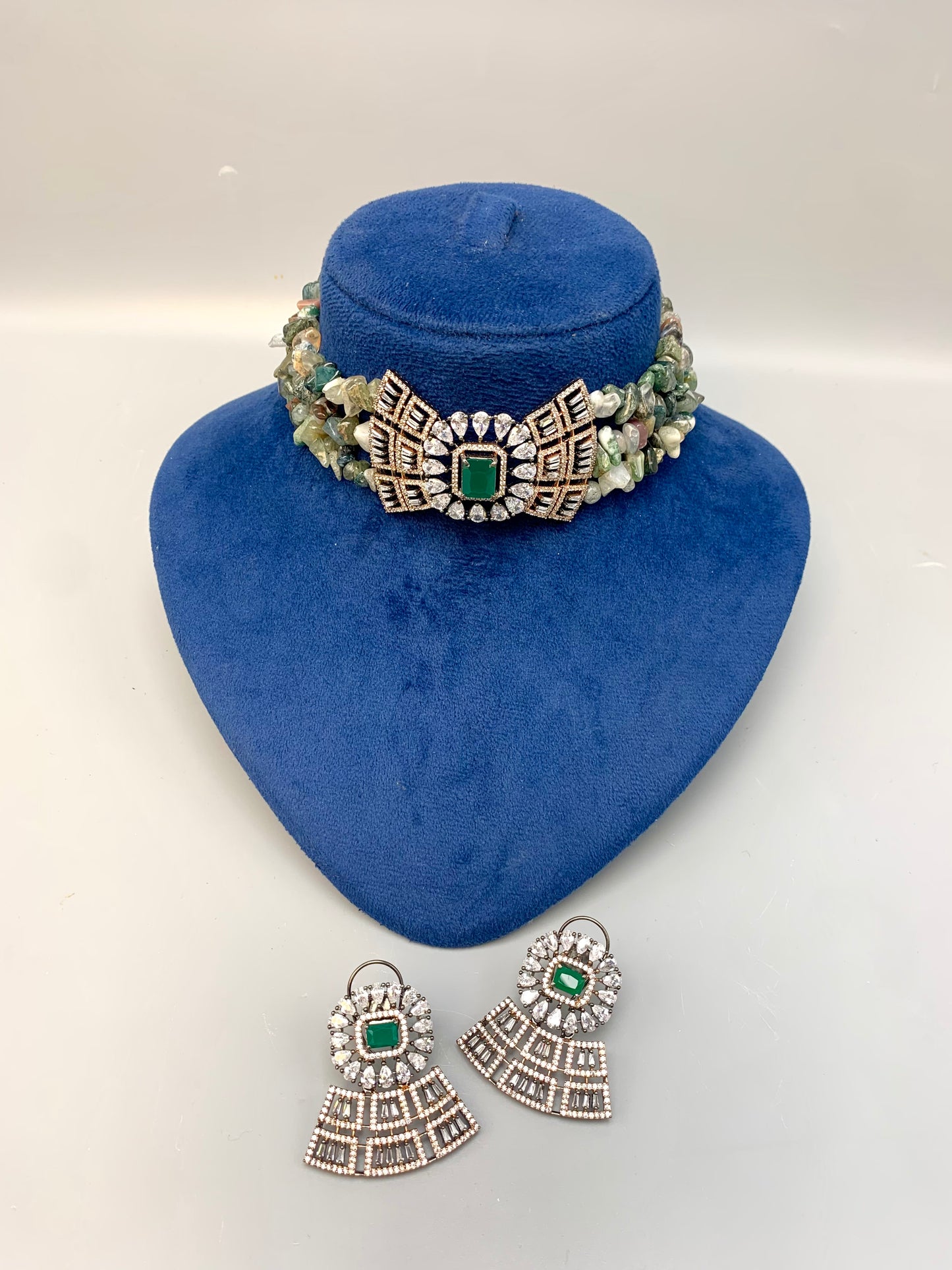 Ramisha handcrafted 22kt rose gold plated choker set with American diamonds, semi-precious emeralds and natural gemstones