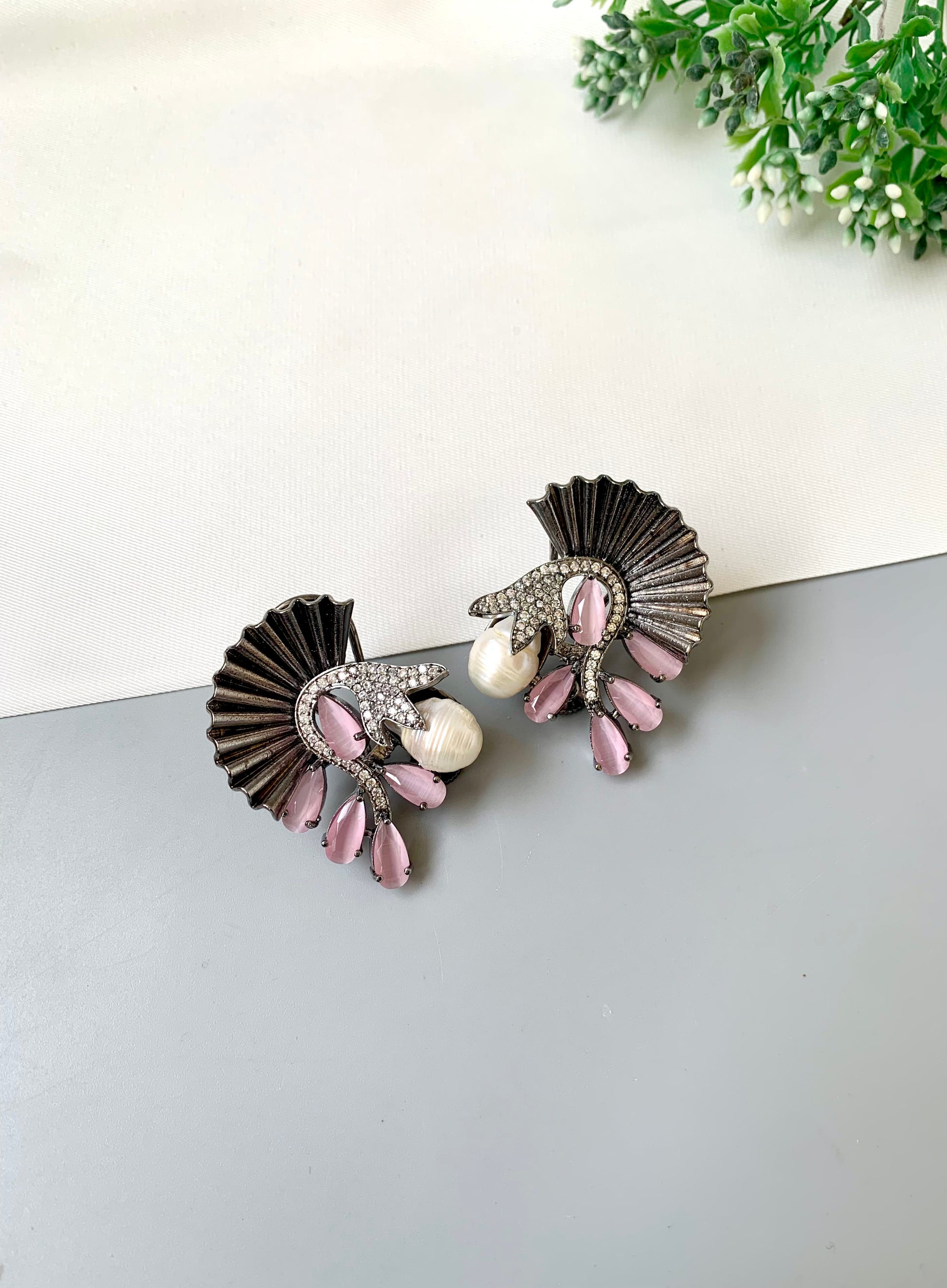 Ravaa pink designer earrings in rhodium plating with baroque pearls, American diamonds and semi-precious pink onyx