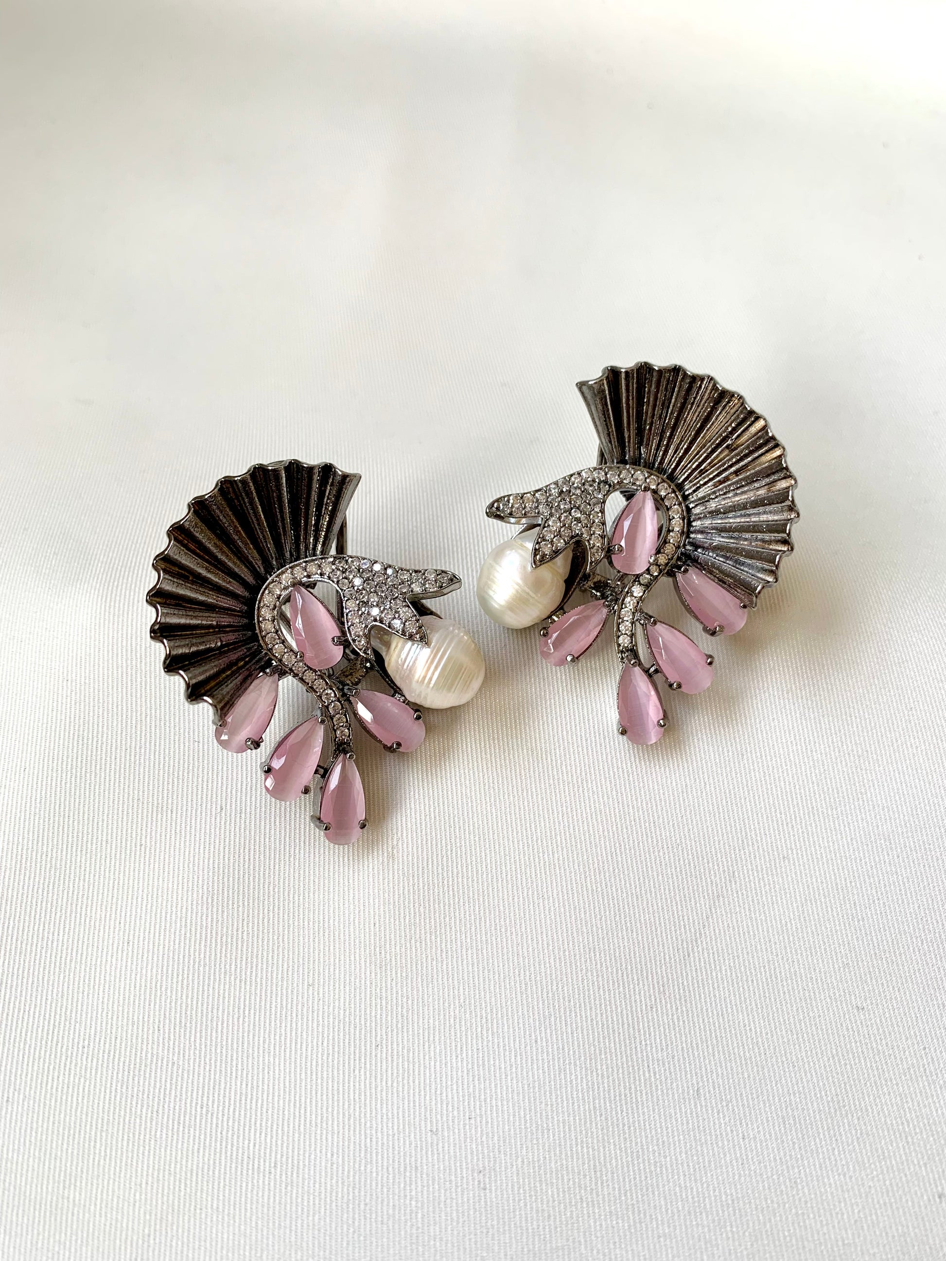 Ravaa pink designer earrings in rhodium plating with baroque pearls, American diamonds and semi-precious pink onyx