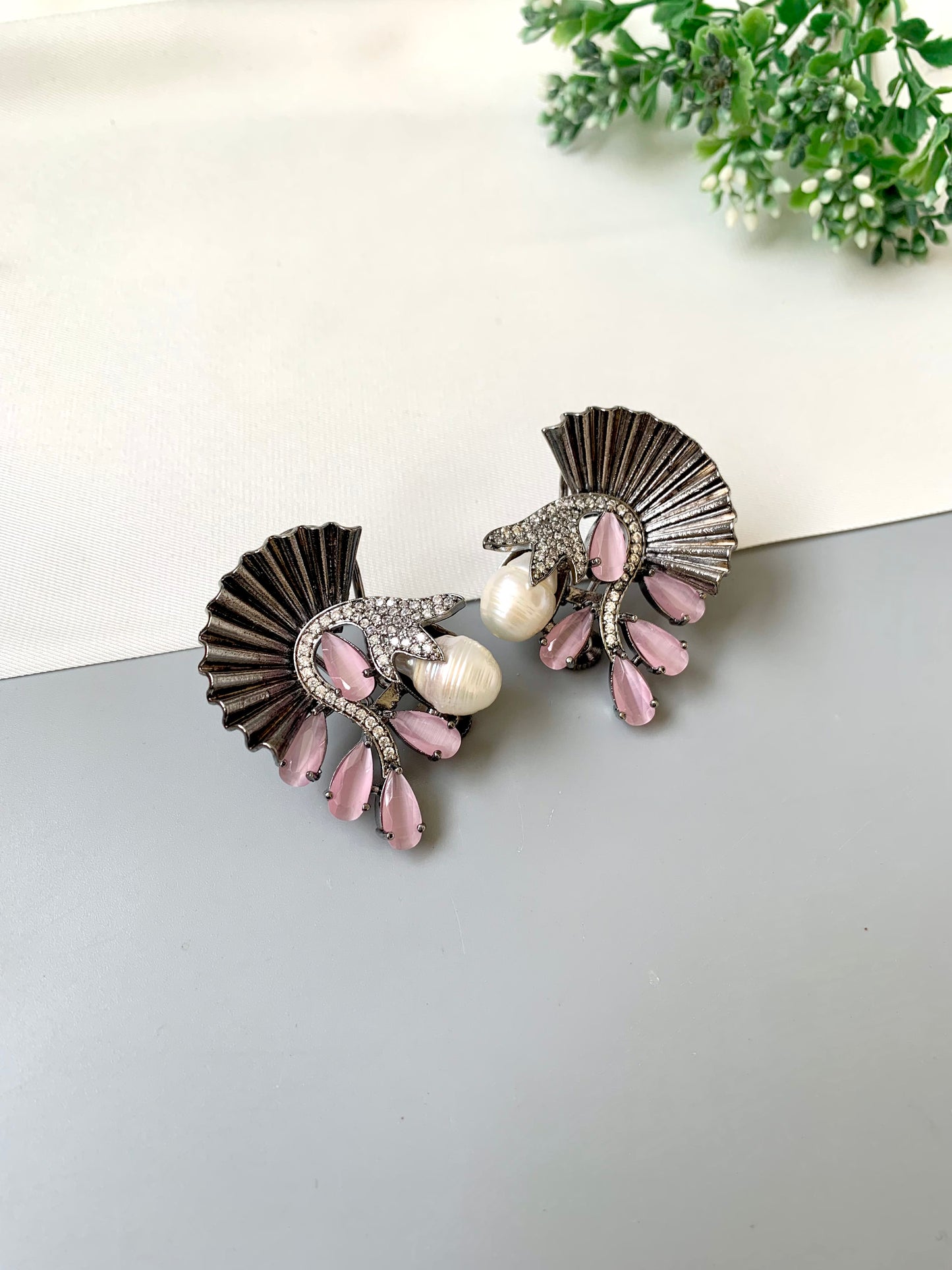 Ravaa pink designer earrings in rhodium plating with baroque pearls, American diamonds and semi-precious pink onyx