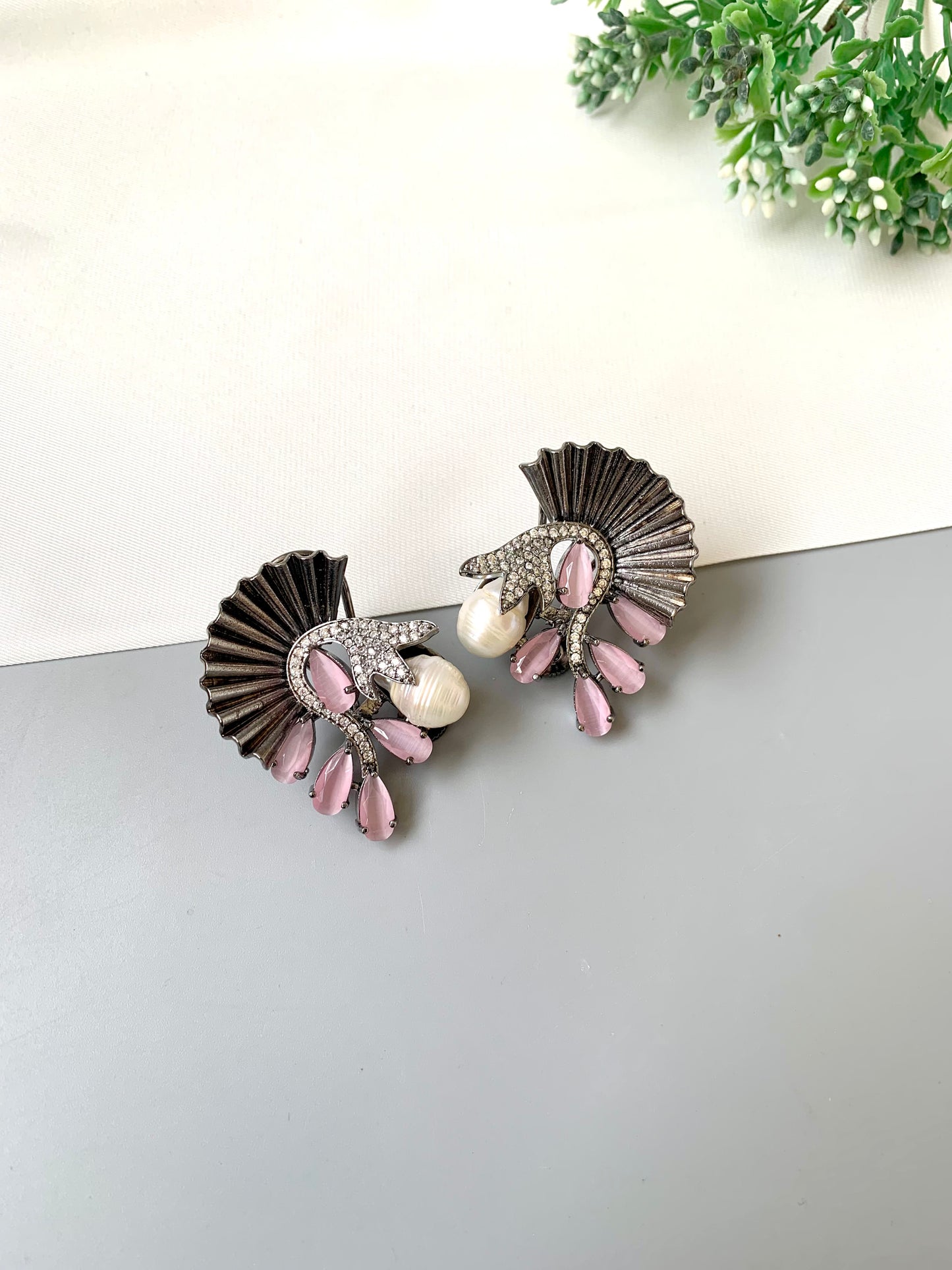 Ravaa pink designer earrings in rhodium plating with baroque pearls, American diamonds and semi-precious pink onyx
