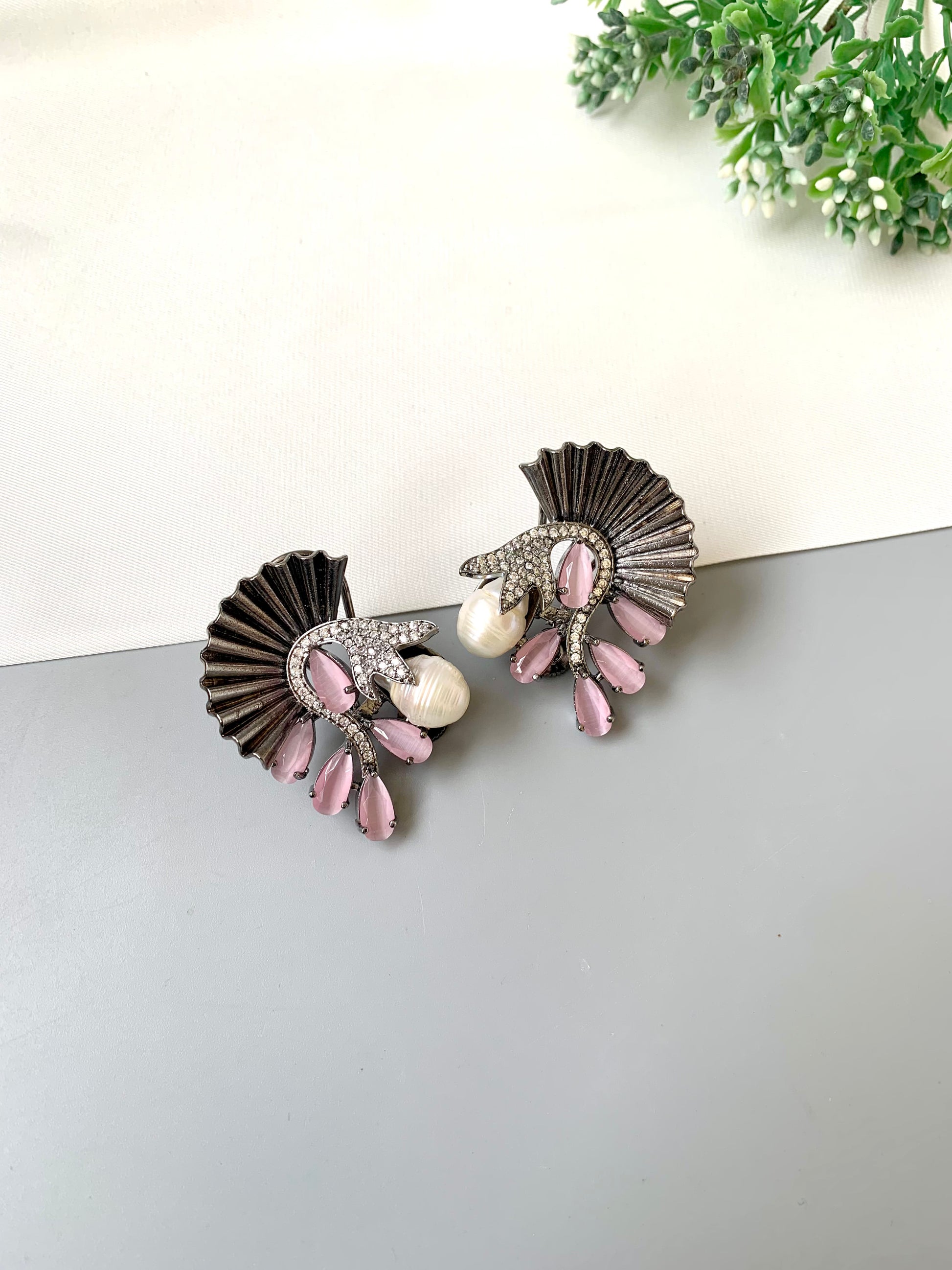 Ravaa pink designer earrings in rhodium plating with baroque pearls, American diamonds and semi-precious pink onyx