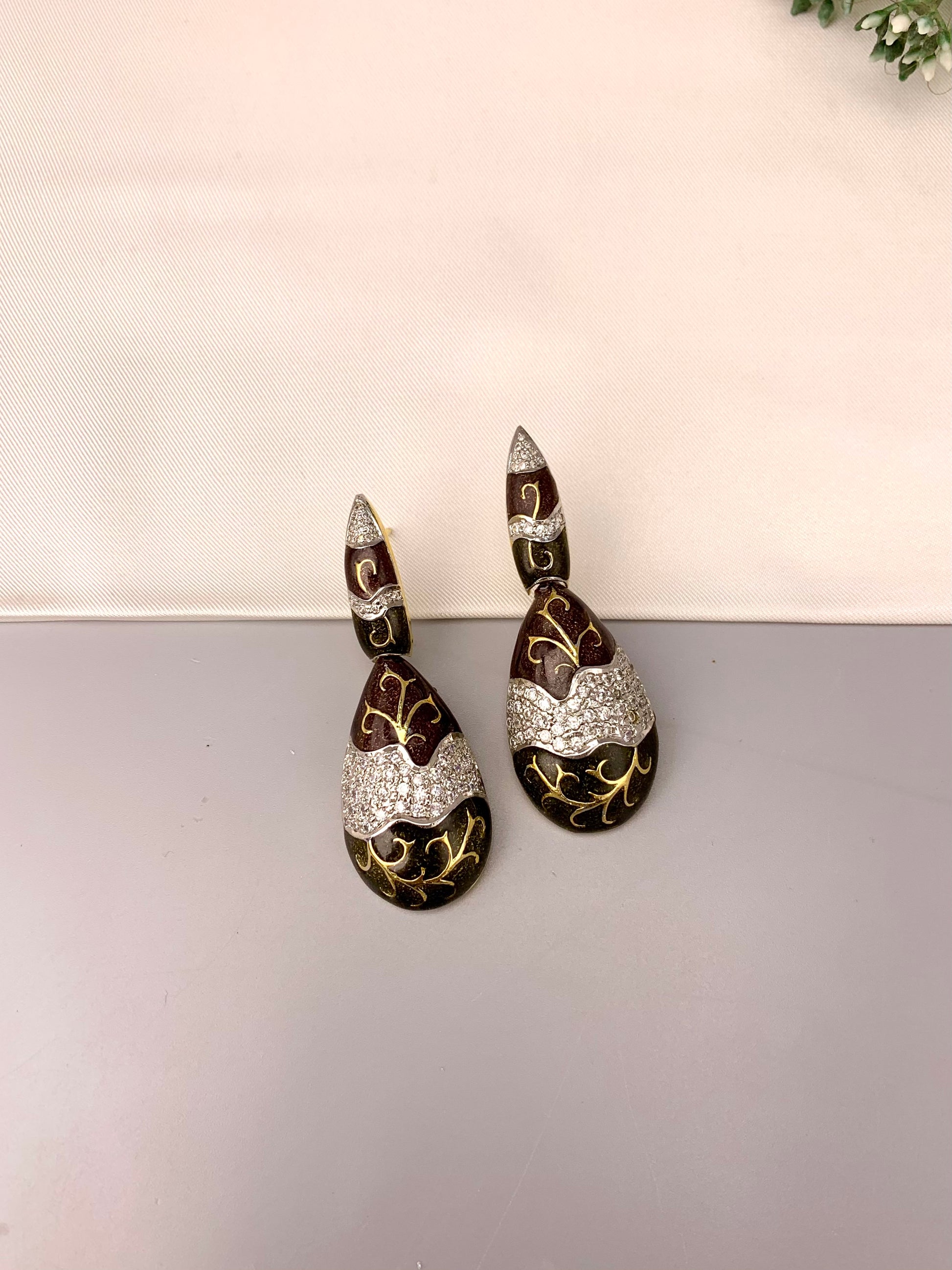 Rayma handcrafted gold plated earrings with American diamonds and hand painted meena work