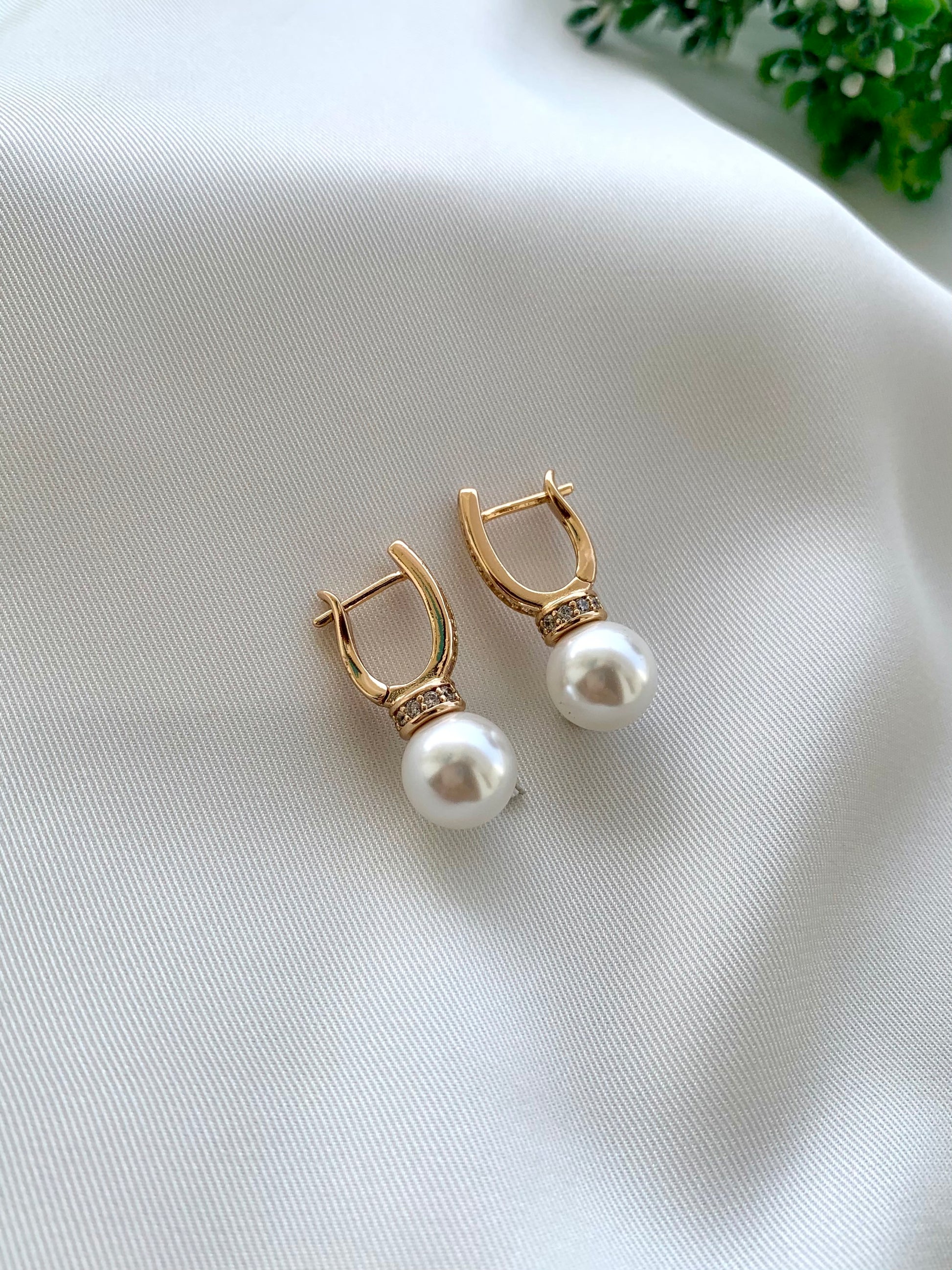 Renu rose gold plated studs with American diamonds and pearl accents